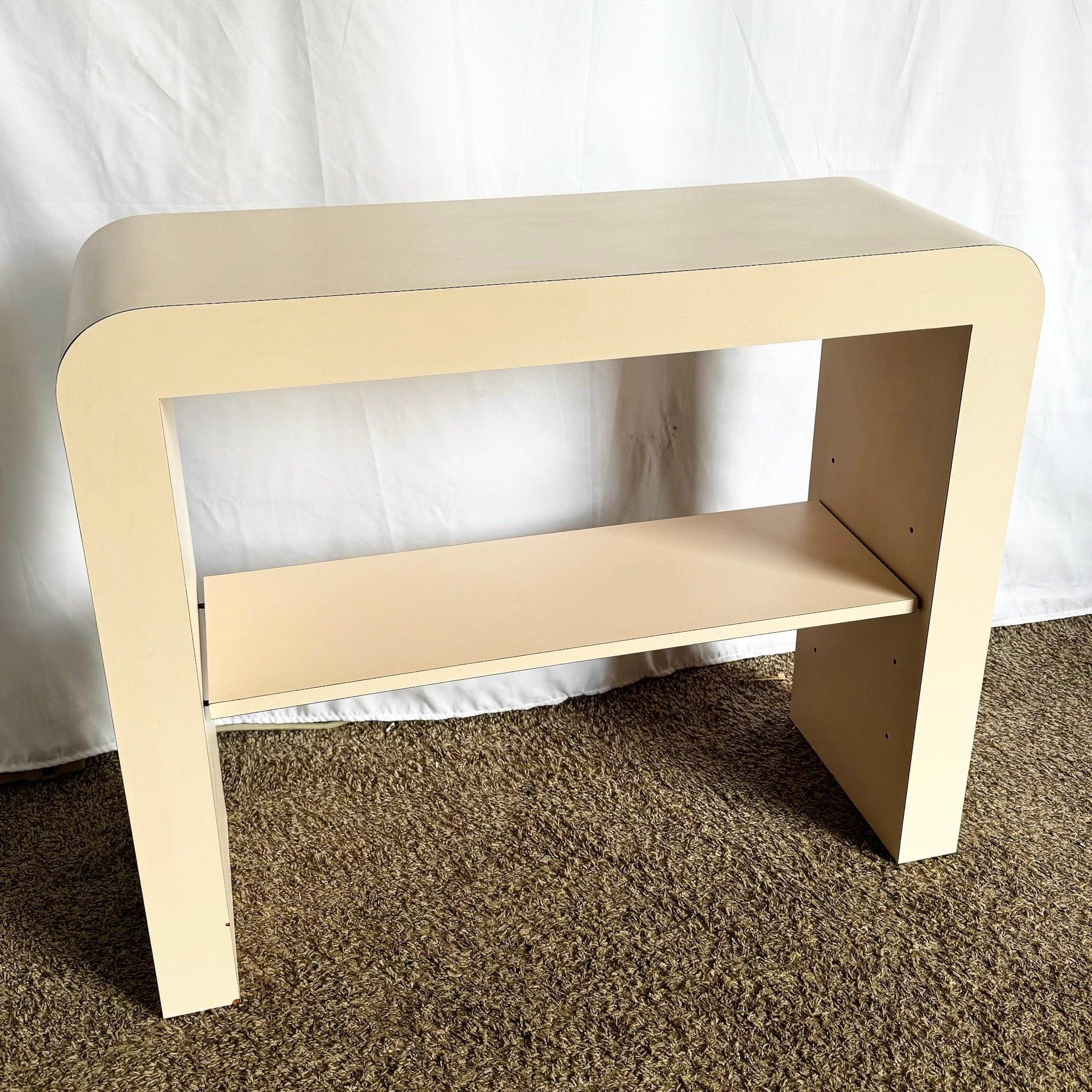 Postmodern Pink Waterfall Console—sleek curved design with adjustable shelf adds minimalist elegance to modern interiors.
 
 Some wear and shops to the edges as shown in the photos. 
 
 We sell items as acquired, without restoring or repairing.
