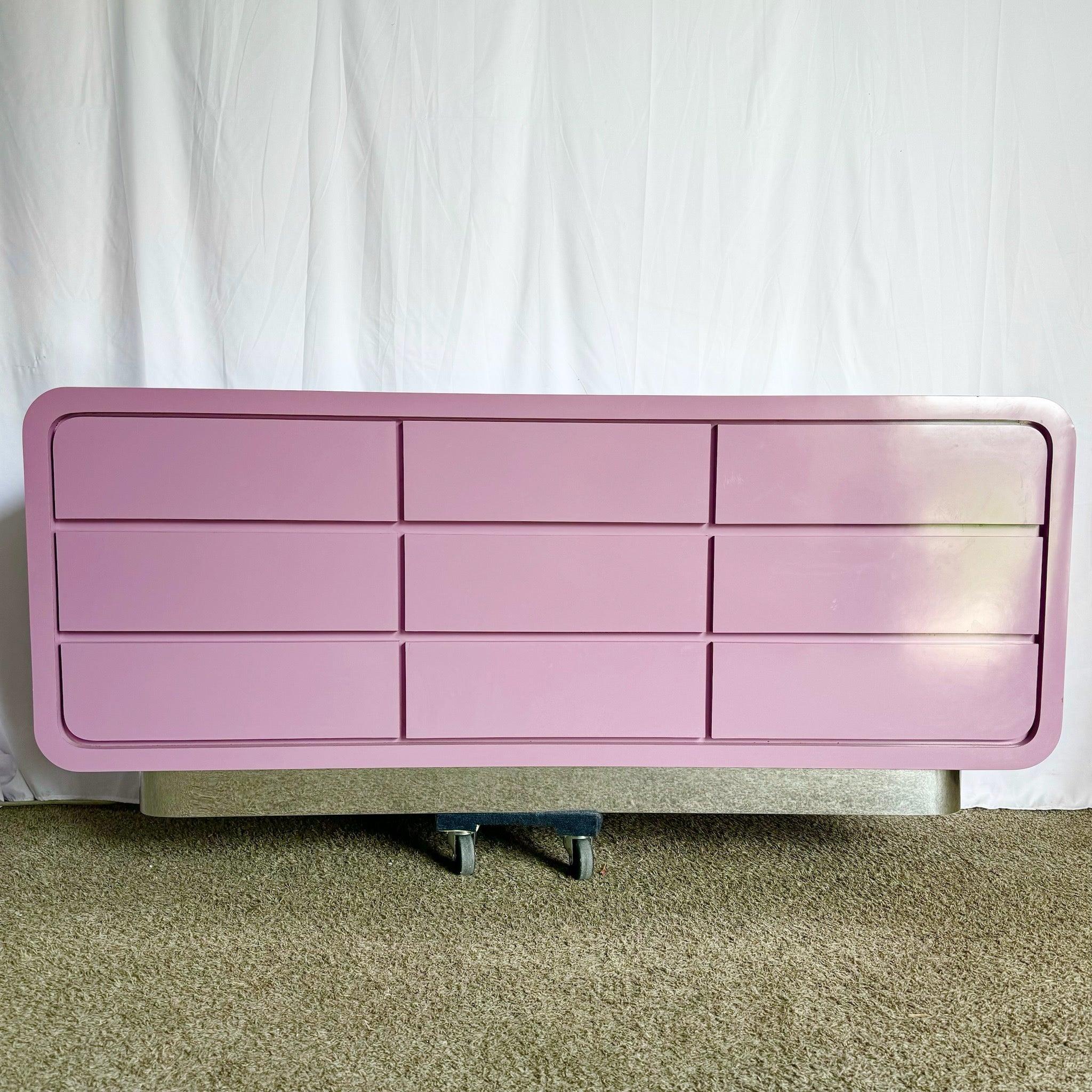 Postmodern Light Purple Waterfall Dresser with glossy finish and chrome base—adds vibrant style to contemporary interiors.​
 
 Minor wear and chips around the edges as shown in the photos. 
 
 We sell items as acquired, without restoring or