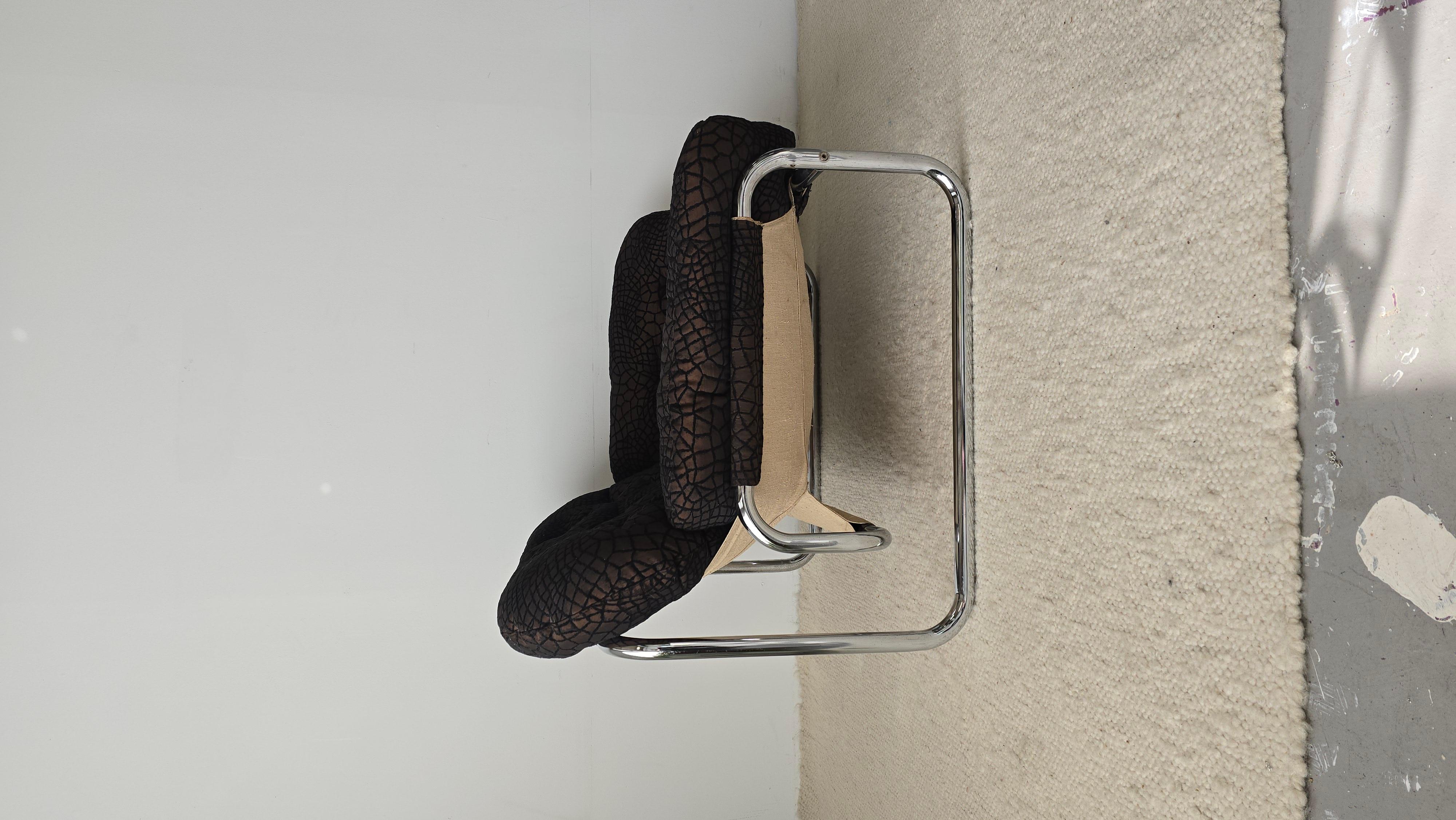 Postmodern Lounge Chair designed by Johan Bertil Häggström for Swed Form. Made in Sweden in 1970s. Upholstered in very cool textured fabric. In overall good/fair vintage condition. Some signs of wear present.
Around 36