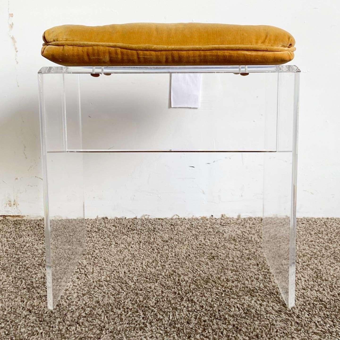 Far out vintage postmodern lucite low stool. Feature a burn orange tufted seat cushion.