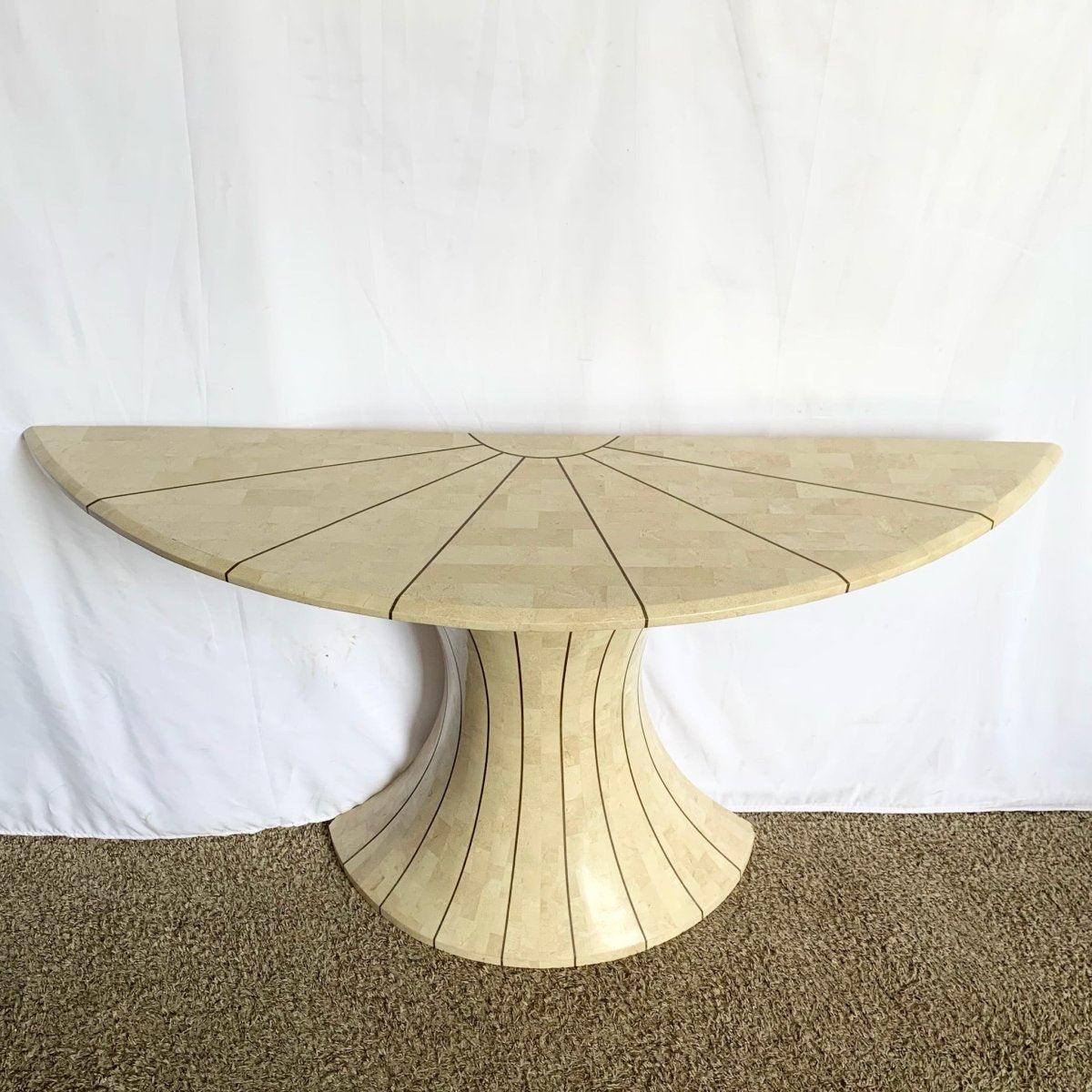 Postmodern Maitland Smith Style Demilune Console accentuates interiors with brass-inlaid sculptural elegance in a refined demi-lune form.
 

 Some chips on the corner of the top and bottom as shown in the photos.
 

 We sell items as acquired,