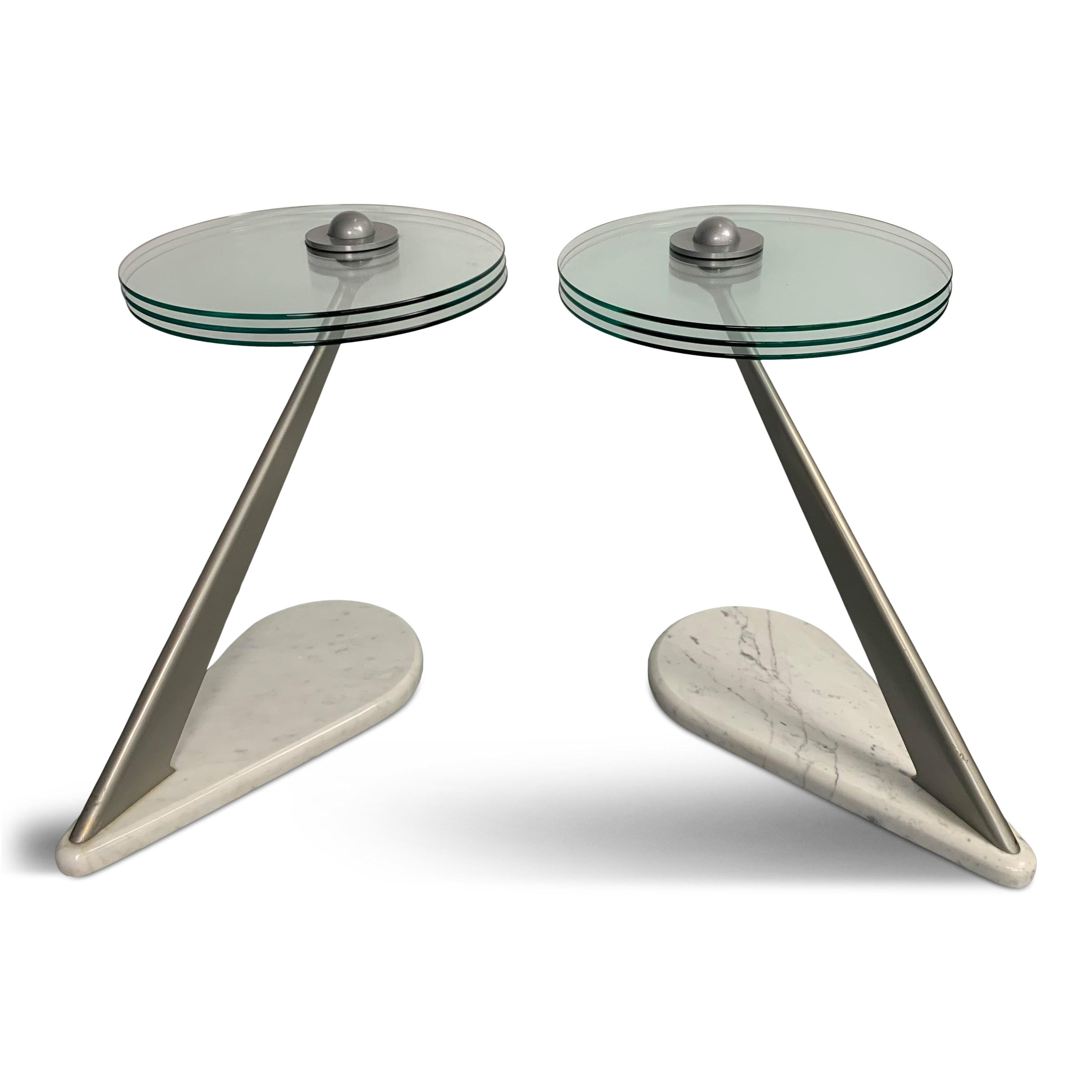 These Postmodern tables designed by famed designer Bruce Kaiser have wonderful elements such as Carrara marble and a futuristic sweeping design.
