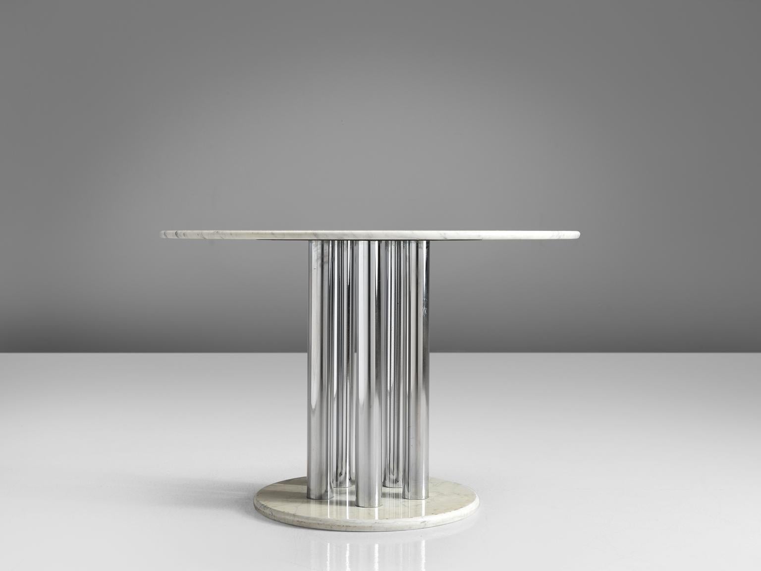 Dining table, marble, metal Italy, 1970s. 

This center table is a skillful example of Postmodern design. The five metal column-like legs hold the white marble top. This table is made in the style of Acerbis.