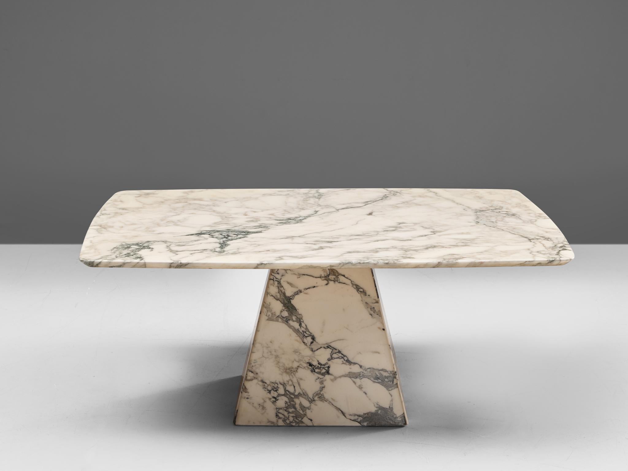 Coffee table, marble, Germany, 1980s

This square coffee table is a skillful example of Postmodern design. The top is square yet slightly curved. The base is pyraid shaped. The aesthetics are archetypical, bearing references to architectural forms
