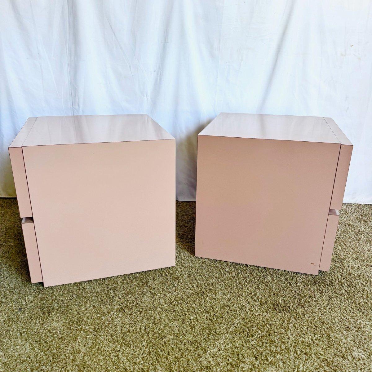 Postmodern Mauve Block Nightstands deliver sculptural 1980s style with glossy mauve finish, recessed storage, and bold minimalism—a refined statement pair.
 

 A chip on the bottom corner as shown in the photos.
 

 We sell items as acquired,
