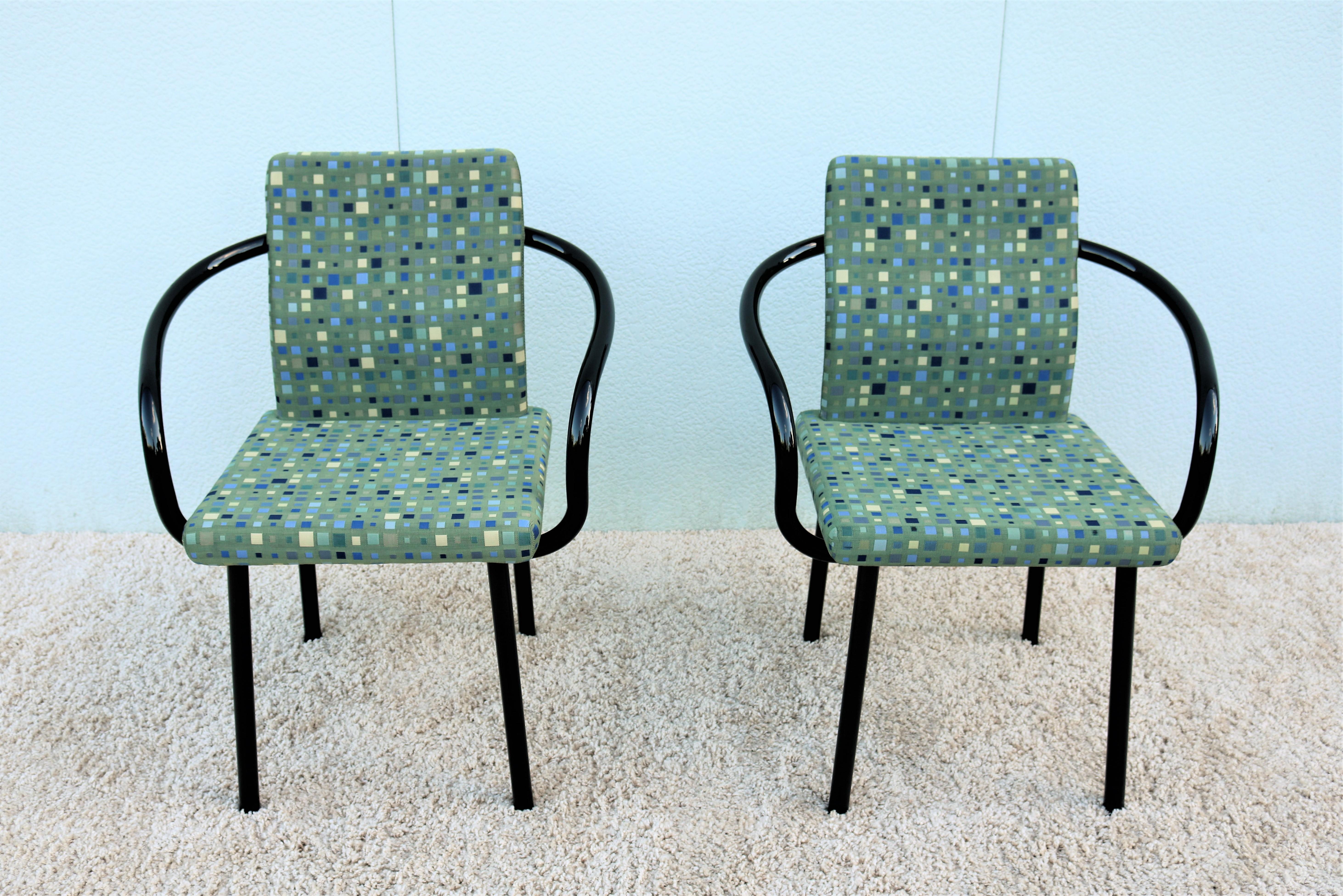 Fabulous and authentic Ettore Sottsass pair of Mandarin armchairs. The Austrian born Ettore Sottsass has been one of the leading Italian designers of the last few decades, in 1980s he become widely celebrated for his bold, colorful and flamboyantly