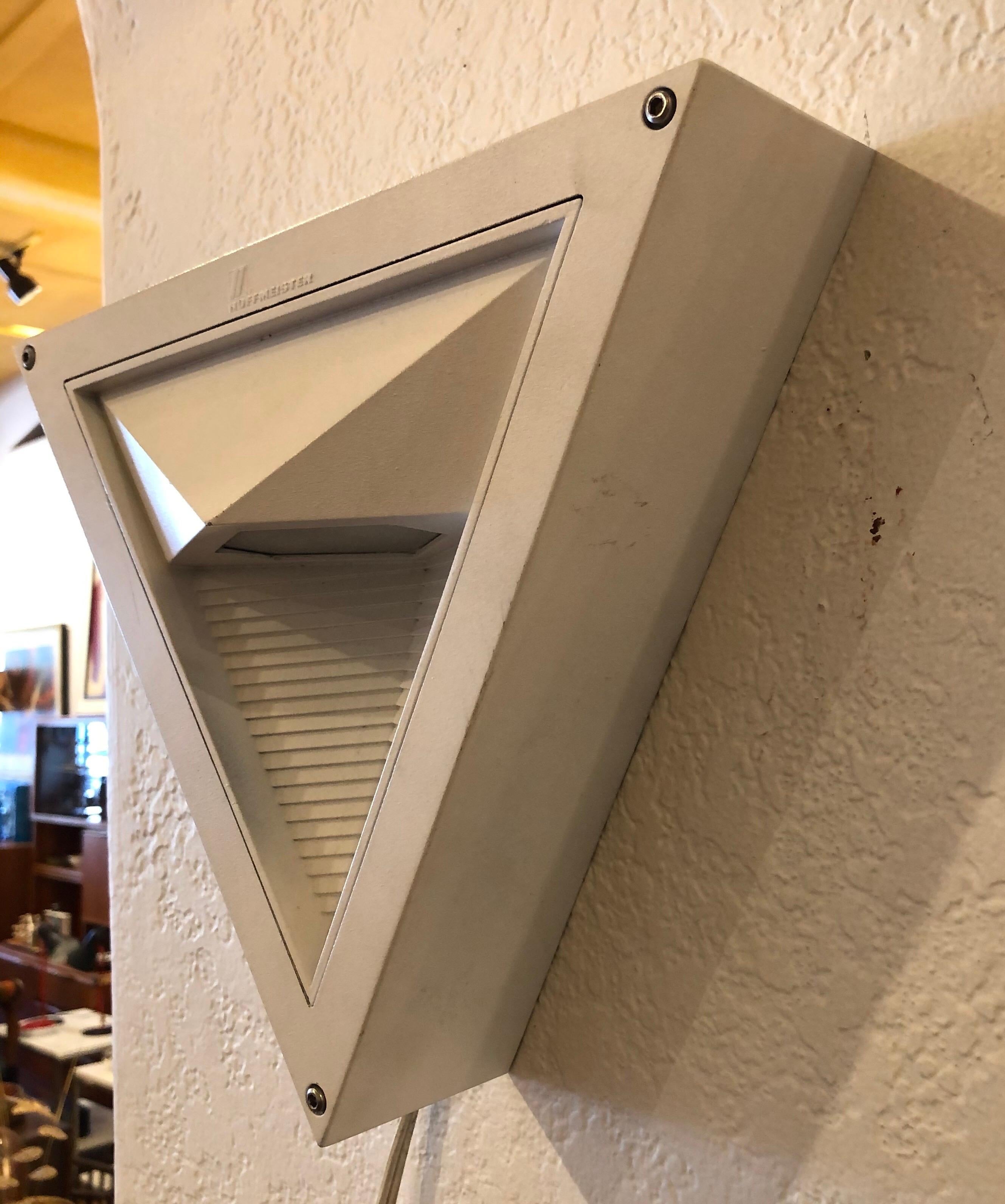 Postmodern triangular electric wall sconce by Hoffmeister of Germany, circa 1980's in cream / white color. in working condition switch off/on the cord.