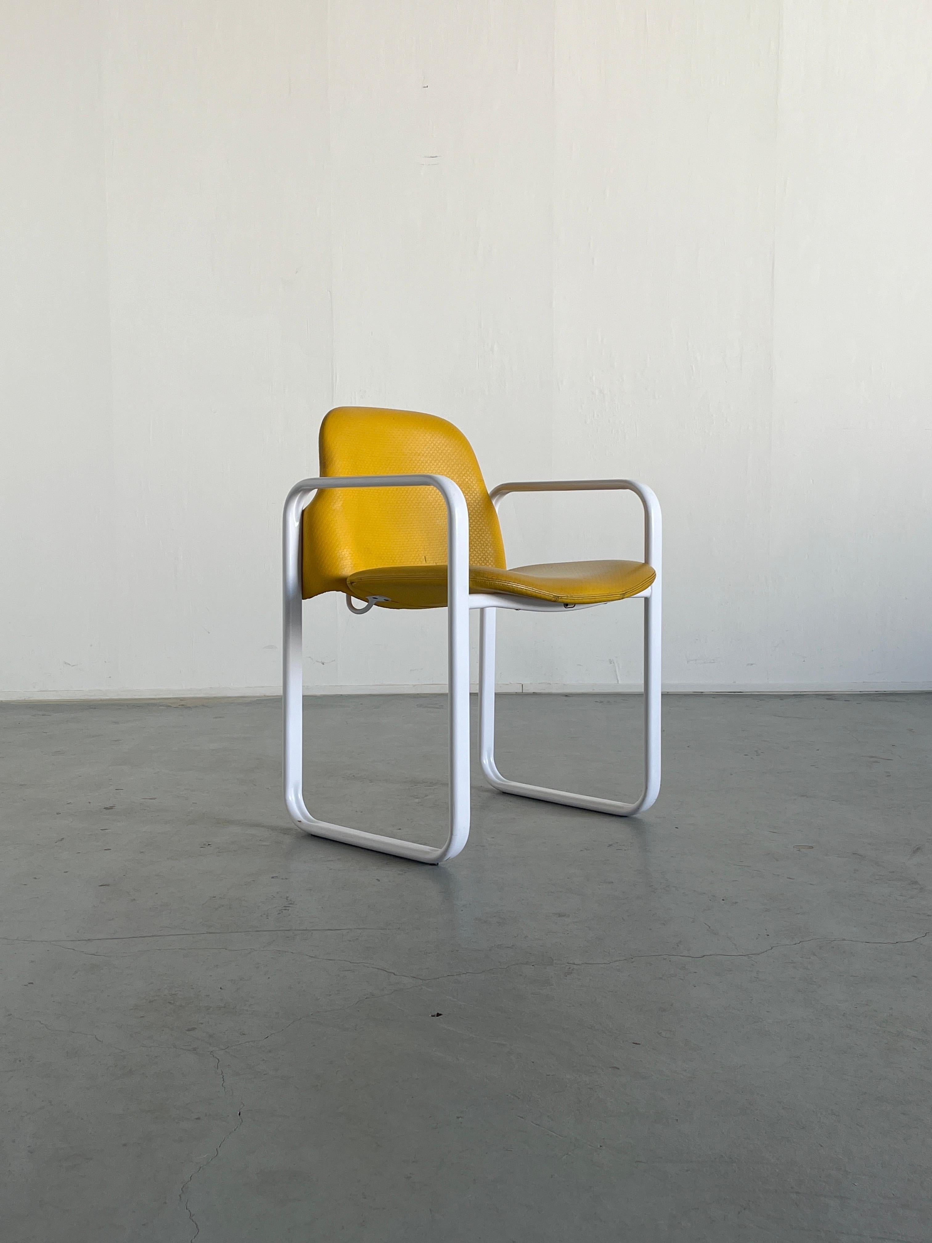 A vintage 1980s postmodern design armchairs, produced by Thema Italy.
White metal structure and yellow faux leather patterned upholstery.
Reminiscent of Orsay chairs by Gae Aulenti for Knoll.

Overall in good condition, but with some wear on the