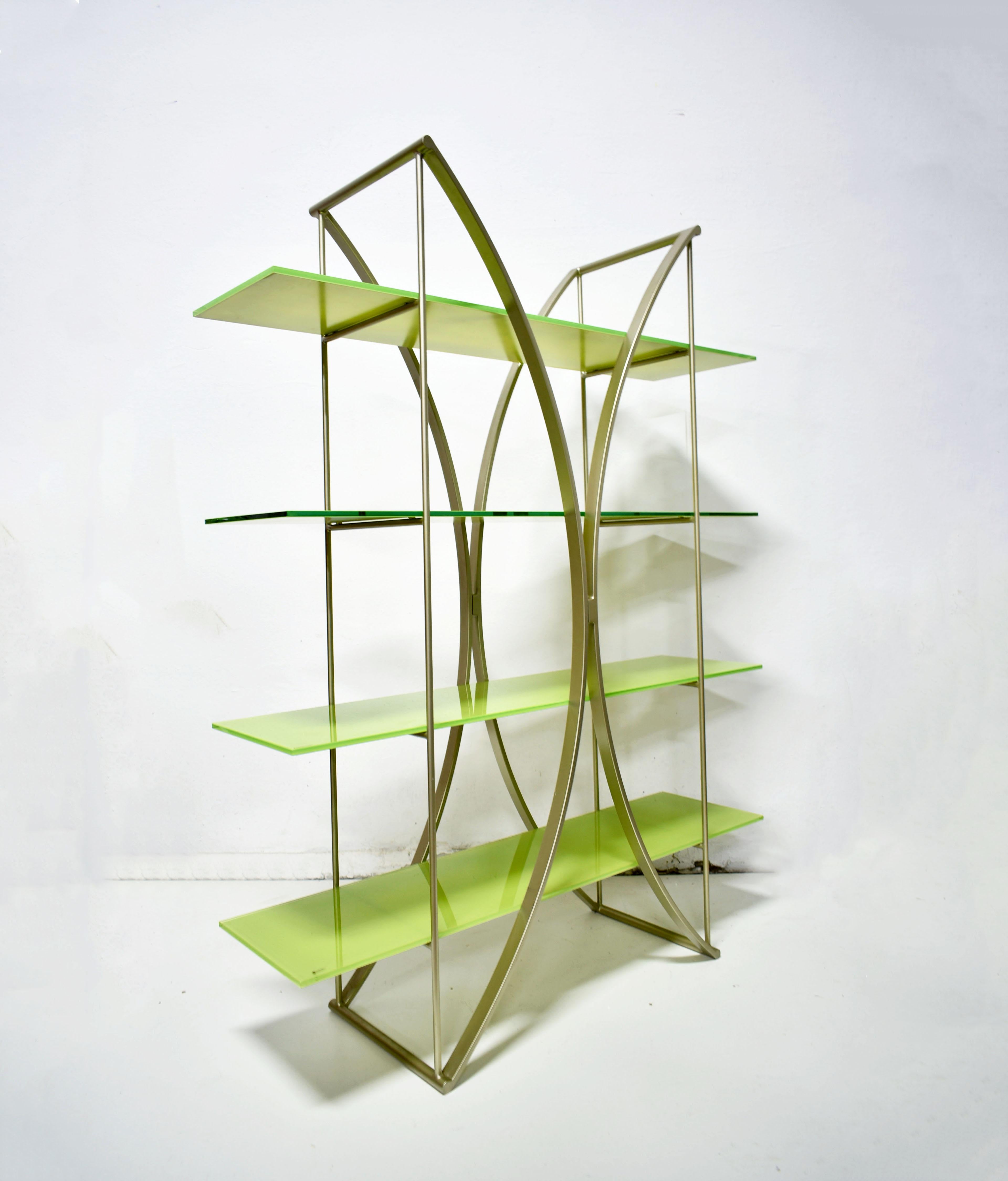 Italian postmodern bookshelves or room divider produced in the 1980s and 1990s by Tonin Casa, Italy. 

The stunning postmodern sculptural form of the bookshelves features a minimalist powder-coated metal structure supporting 4 heavy weighted shelves