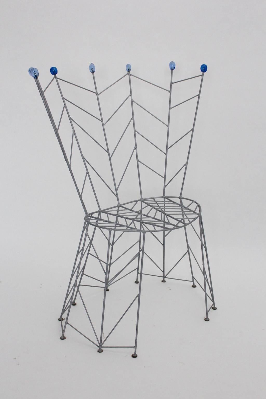 Postmodern sculptural metal blue blown glass vintage side chair or chair designed by Bohuslav Horak, 1988, Czech Republic.
He worked with the artist group Atika ( 1987-1992).
Bohulav Horak outstanding design creations are utensils, which become to