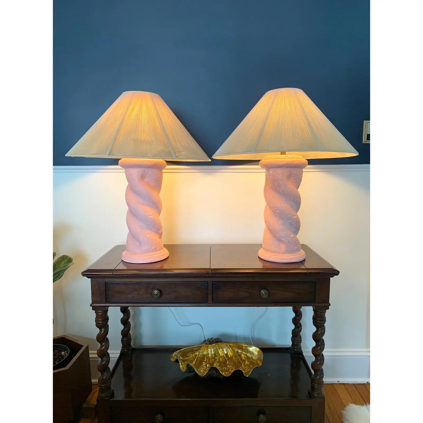 Beautiful Plaster Twist lamps in the manner of Michael Taylor. Unique pink finish! Awesome postmodern design and styling!

Shades and harps for staging purposes only.