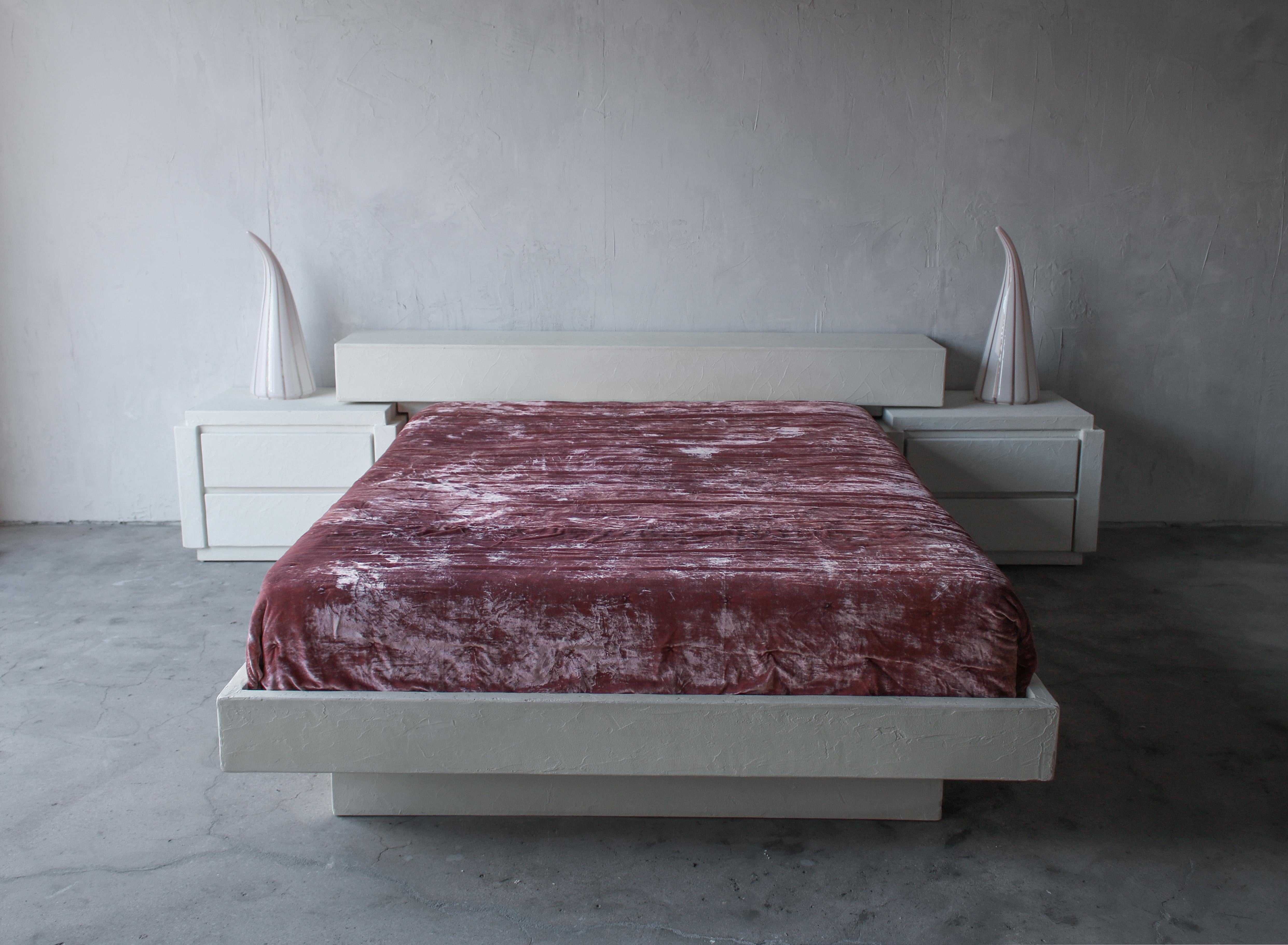 Wonderful Postmodern plaster queen size platform bed with matching nightstands. This set is so beautiful and right on trend with the Minimalist design that has become so popular. The nightstands are separate from the headboard, see image of