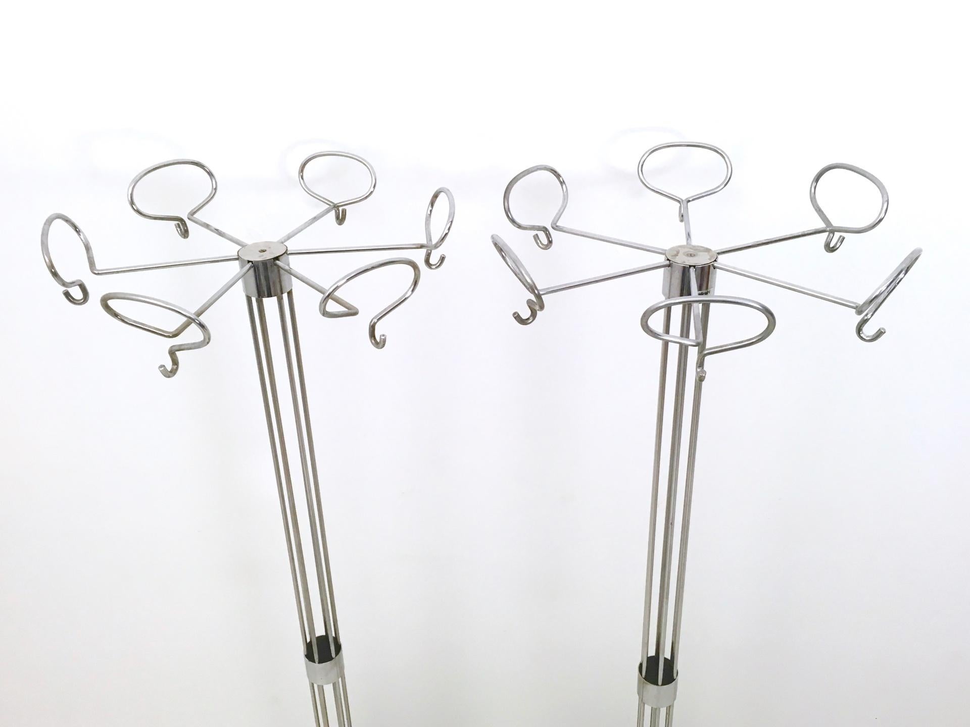 Made in Italy, 1960s. 
This coat rack is made in chrome-plated metal and features a metal base covered in plastic. 
It is vintage, therefore it might show slight traces of use, but it can be considered as in perfect original condition.
Marked.
