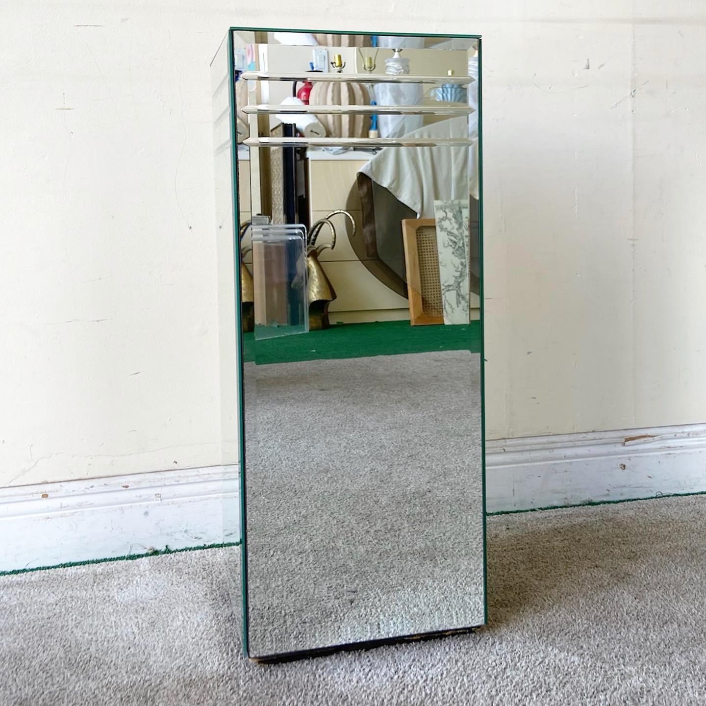 Amazing postmodern rectangular pedestal. The top of each side features three beveled mirrors above a rectangular mirror.