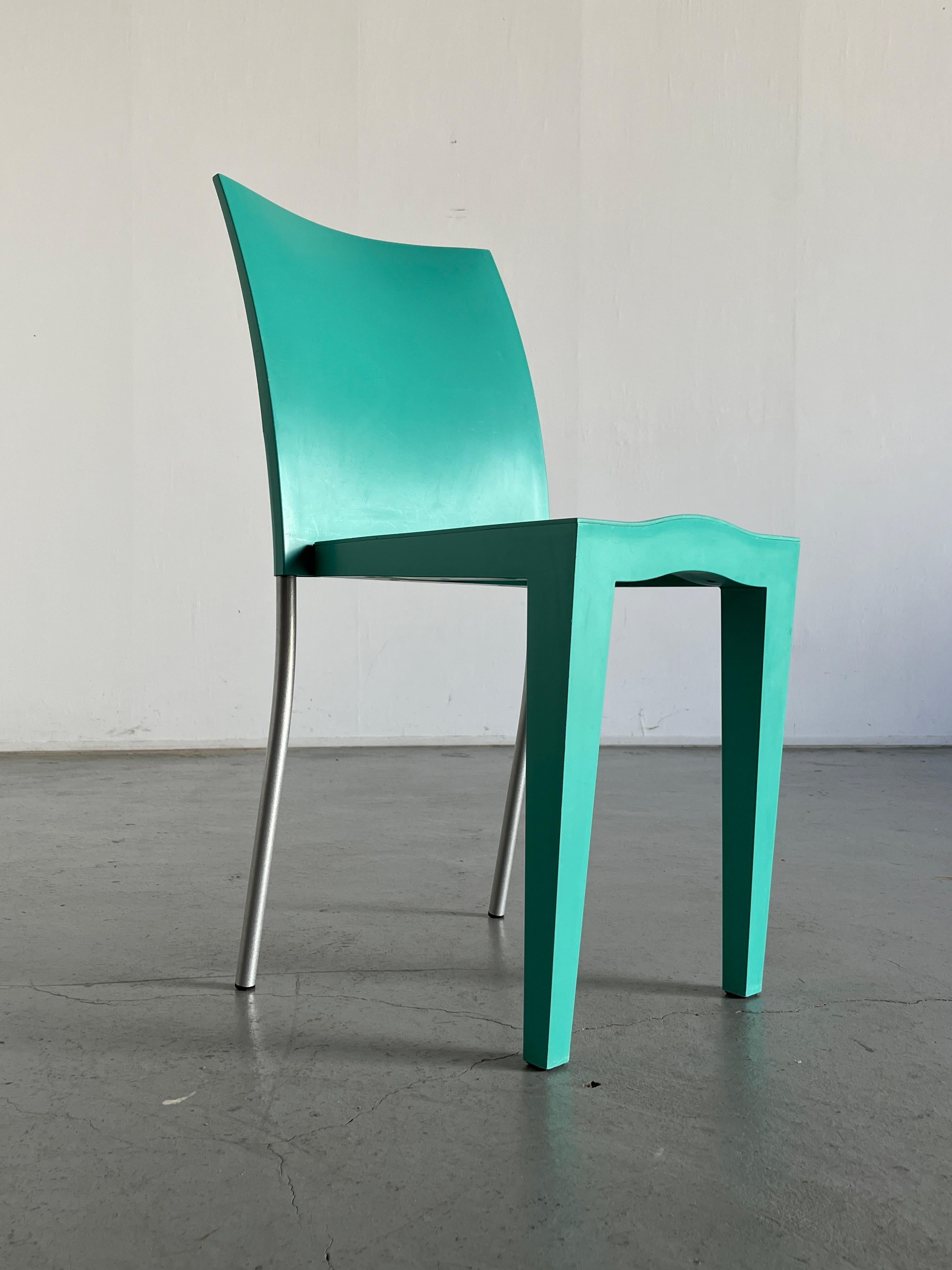 Beautiful vintage postmodern chair, model 'Miss Globe', designed by Philippe Starck and produced by Kartell during the early 1990s.

Good vintage condition with some expected signs of age, as can be seen from the photos.
A smaller burn mark on the
