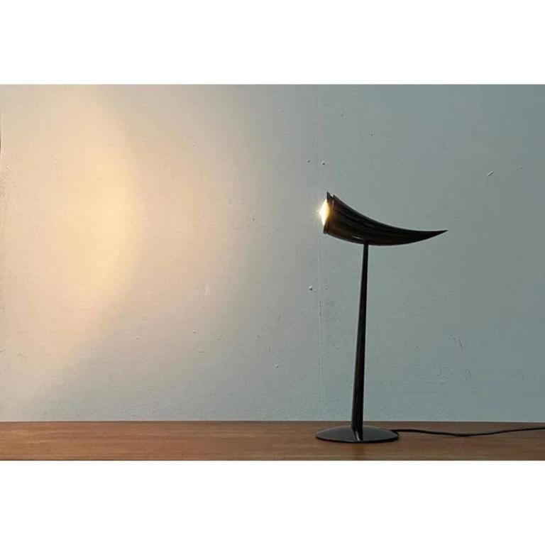 A design classic from flos according to a design by designer philippe starck from the 80s.

A postmodern design of special materiality and a unique function. Postmodern accents are shown in the different forms that come together harmoniously. The