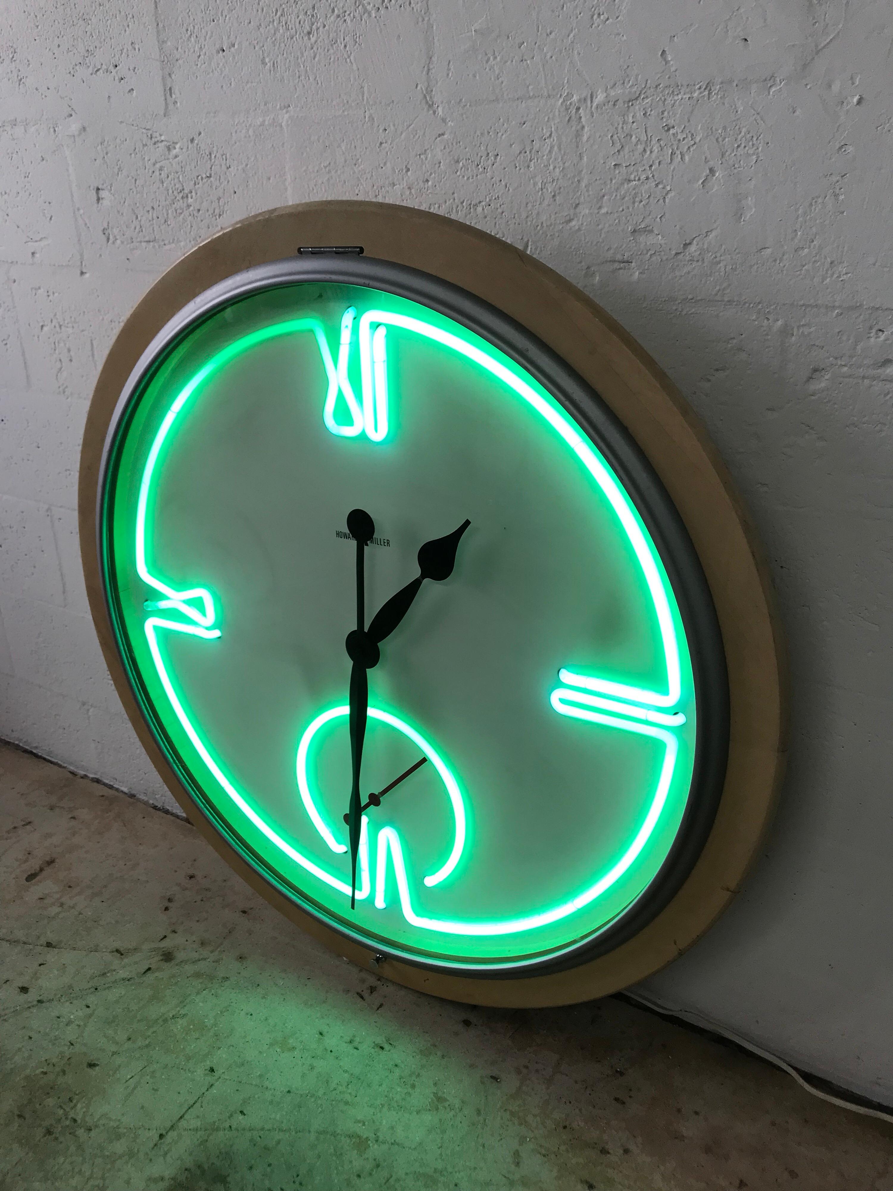 Large-scale neon wall clock by Howard Miller, in the 1980s Art Deco Renaissance style.