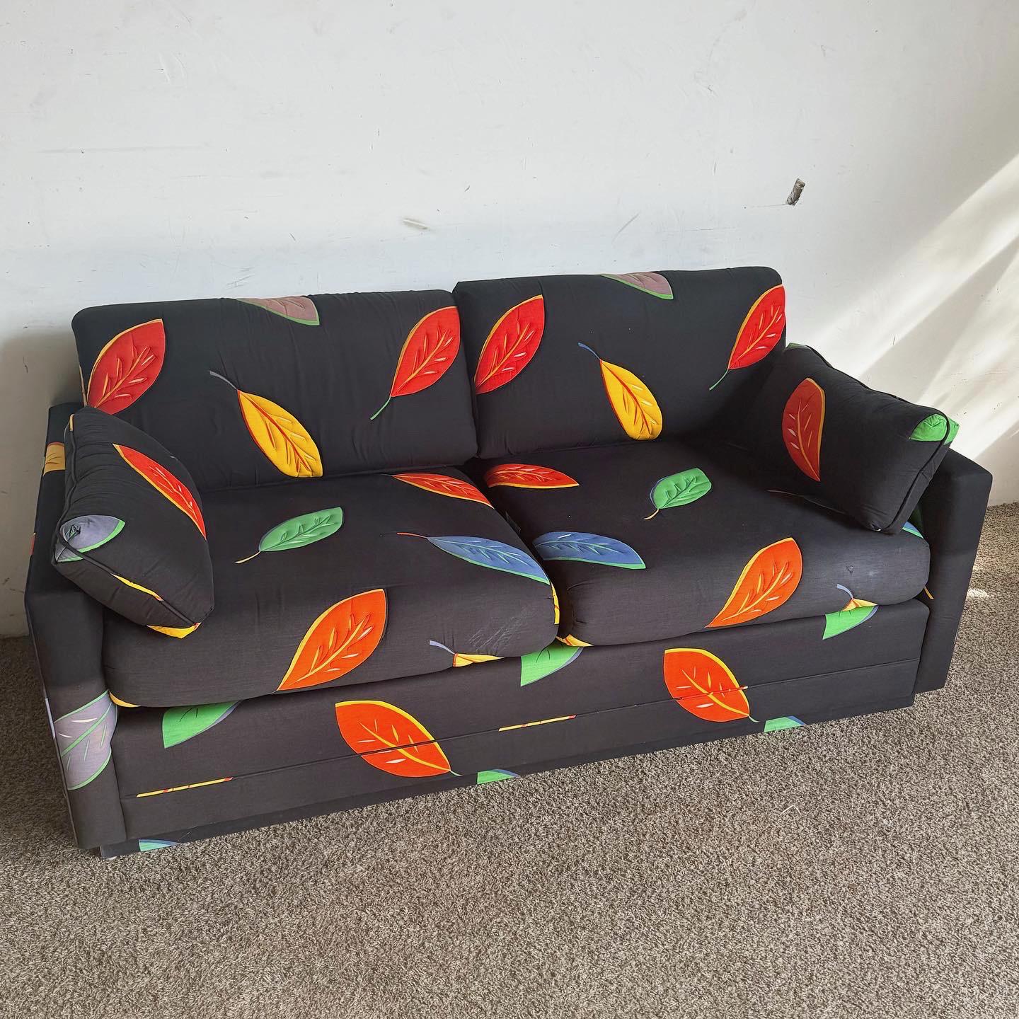 Elevate your decor with the Postmodern Multi Color Leaf/Black Fabric Sofa/Love Seat, featuring a vibrant leaf pattern for a contemporary living space.
Some wear and sports to the fabric as seen in the photos.