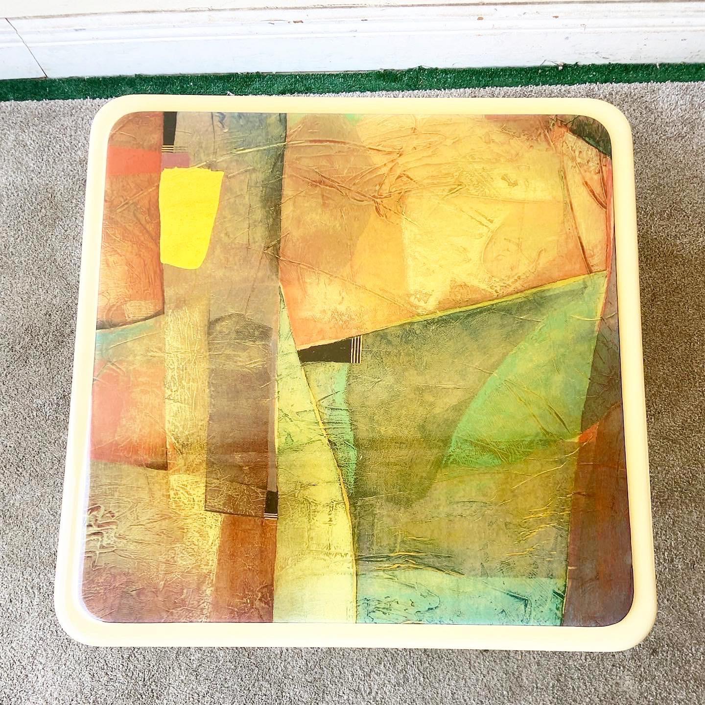 Amazing postmodern mushroom side tables. Each feature an abstract multi color top with a cream laminate base.

Additional information: 
Material: Wood
Color: Cream, Gold, Green, Red
Style: Postmodern
Time Period: 1980s
Place of origin: