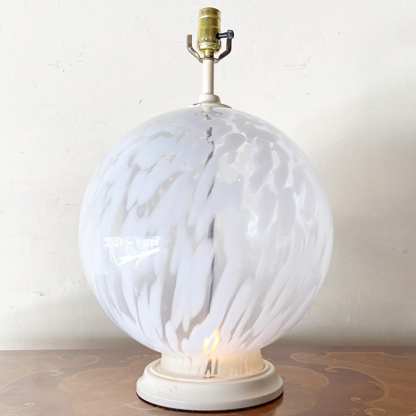 Exceptional postmodern Italian Murano glass table lamp. Features a large spherical white and transparent body.

4 settings: both lights, top light, bottom light, off