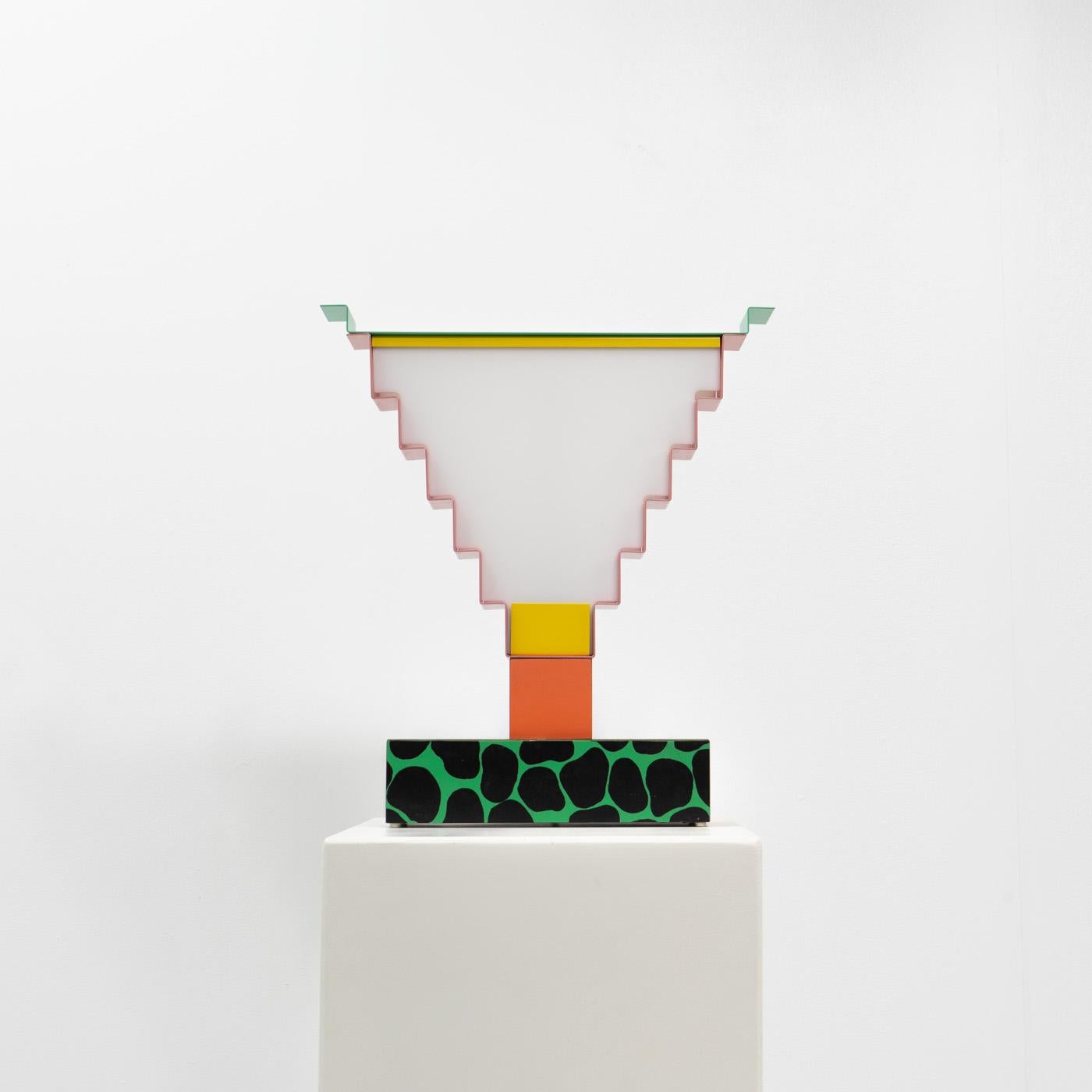 Table lamp by Nathalie du Pasquier and George Sowden, for the series “Objects for the Electronic Age”.

Nathalie du Pasquier & George Sowden, founding members of the Memphis-Milano group collaborated together to create a set of limited edition,