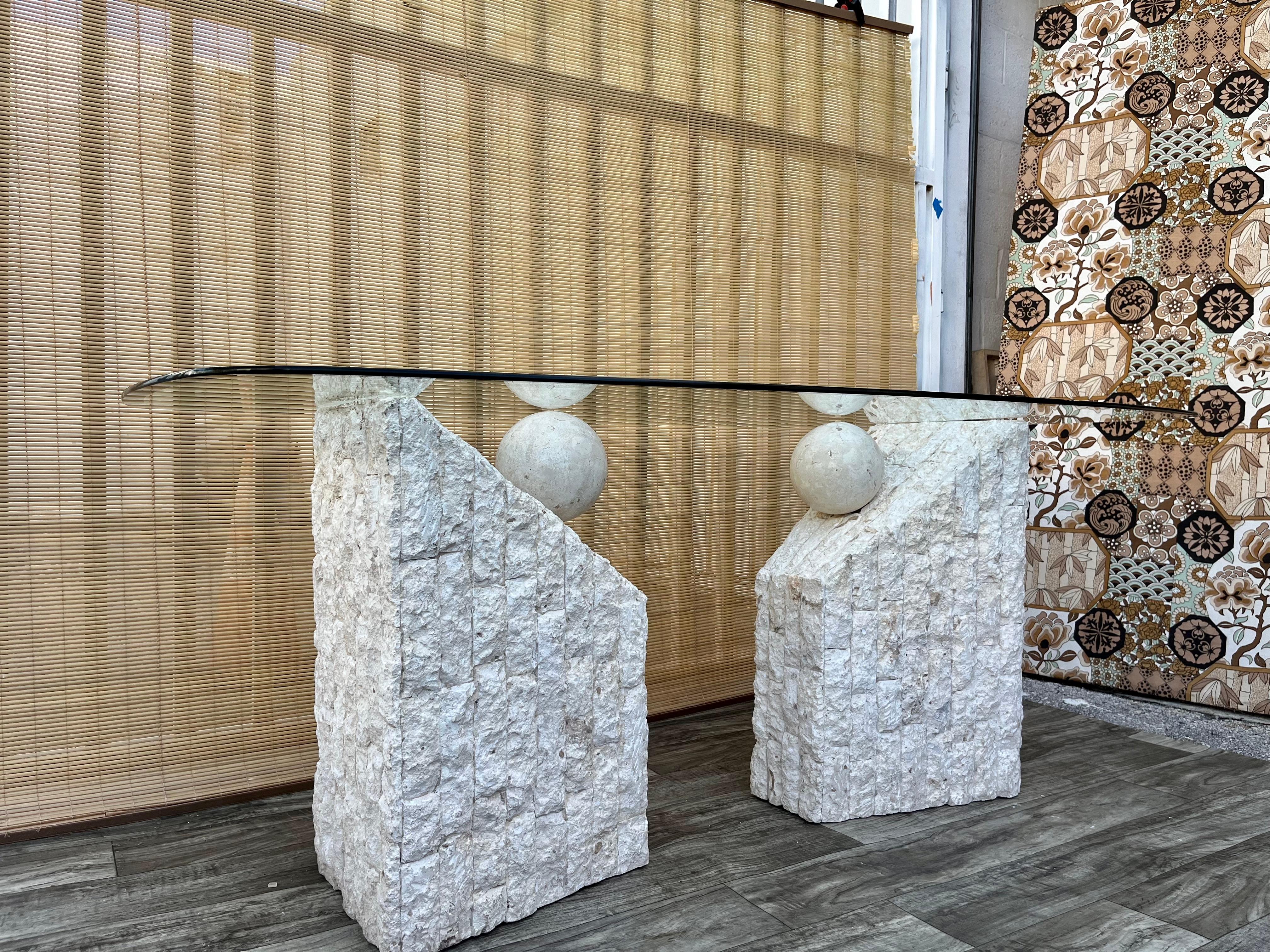 Late 20th Century Postmodern Natural Mactan Stone Glass Top Dining Table w/ Pedestals. Circa 1980s