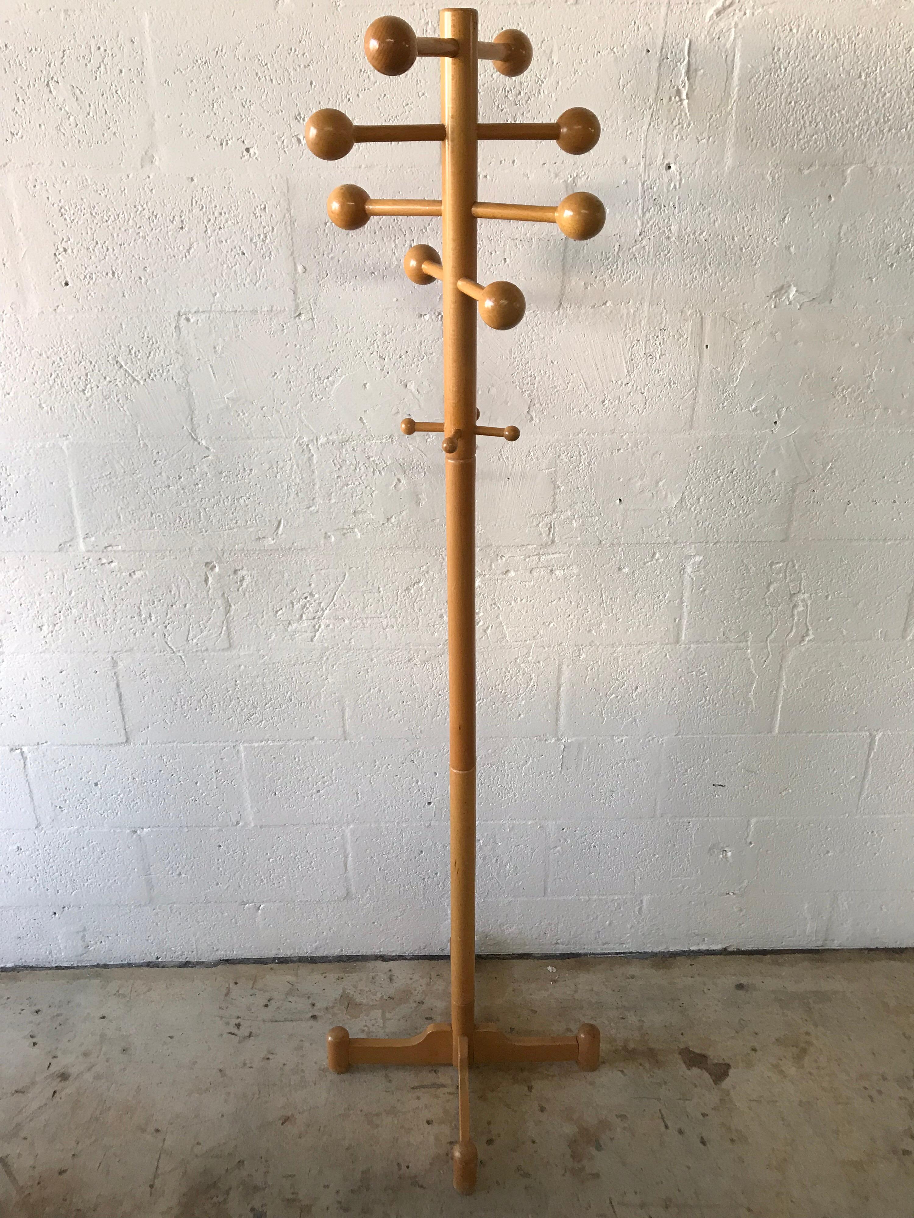 Postmodern coatrack or stand rendered in oak.