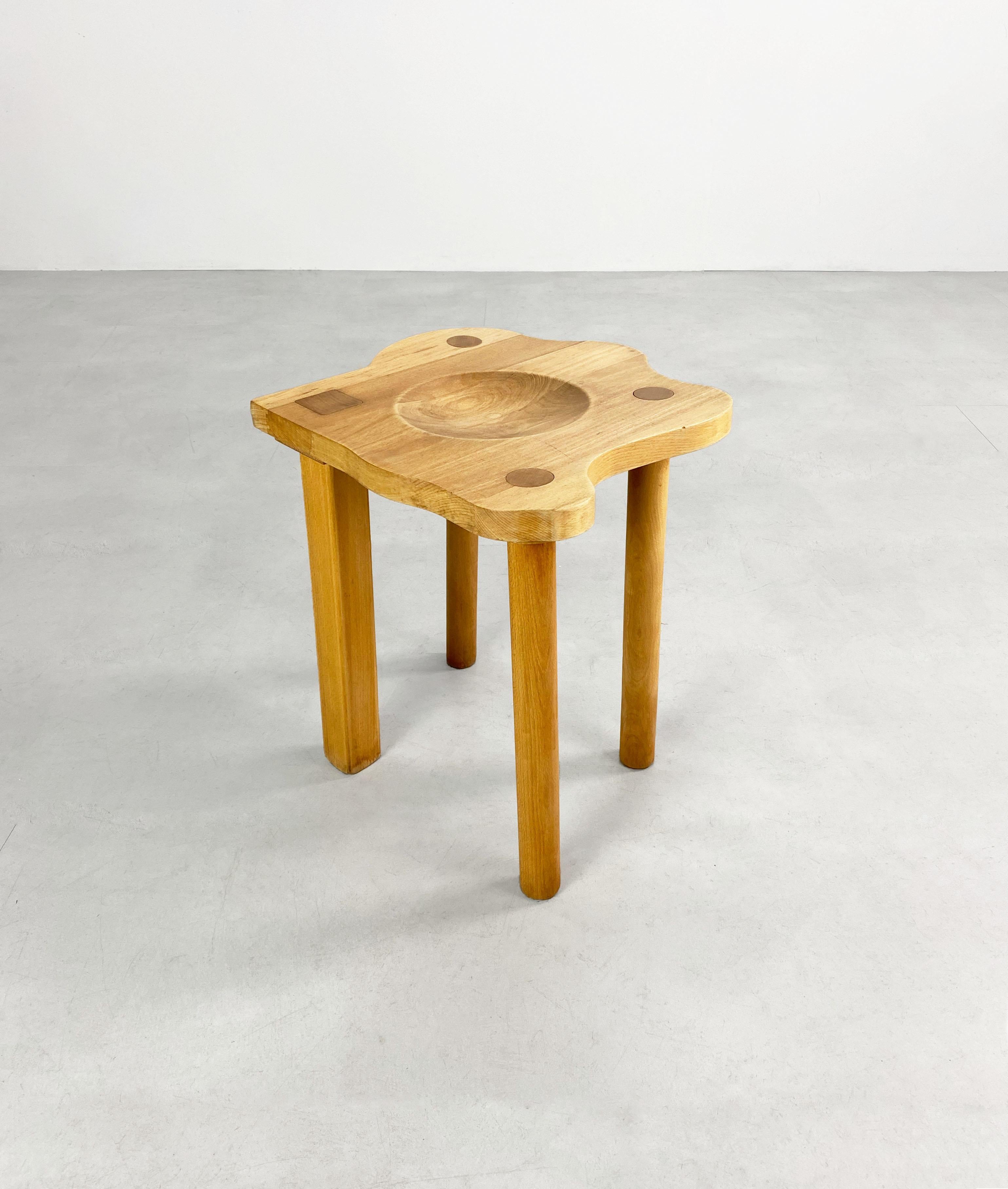A playful Postmodern stool in solid oak from E.R.A Herbst produced c.1980/90. 

Dimensions (cm, approx): 
Height: 46
Width: 41
Depth: 43.