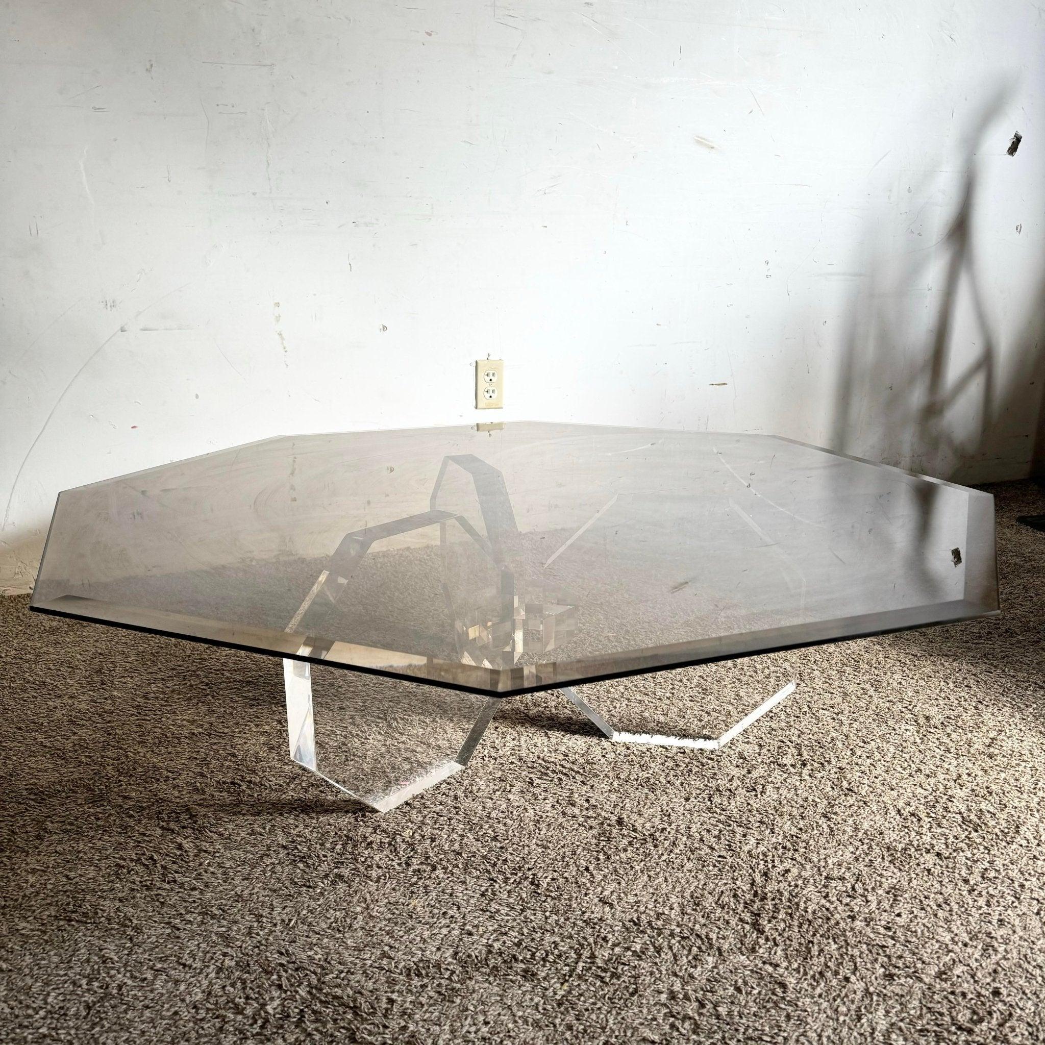 Postmodern Lucite Smoked Glass Coffee Table with octagonal top and Lucite base, a bold geometric piece for contemporary interiors.
 
 Minor wear and scratched to the glass and lucite as shown in the photos.
 
 We sell items as acquired, without
