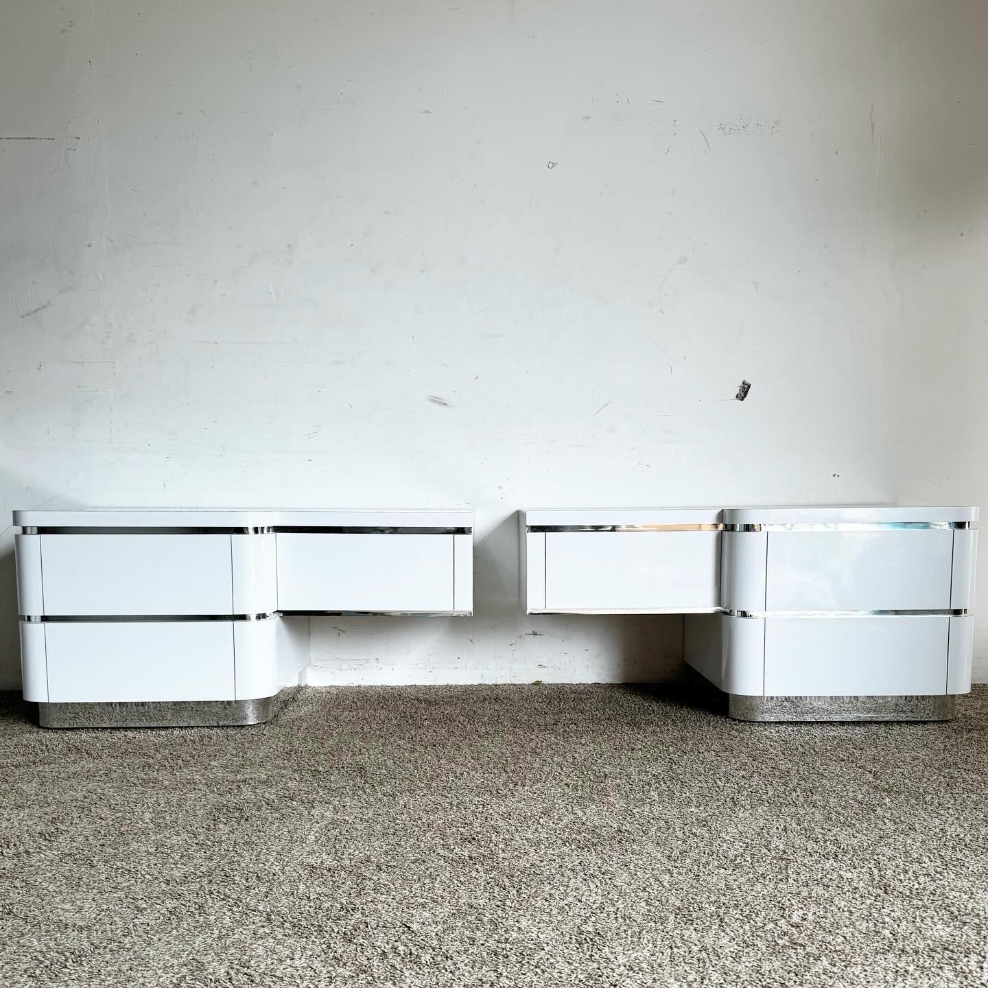 Elevate your interior with these Postmodern Oversized White Lacquer Laminate and Chrome Nightstands/Dressers. Offering versatility and modern style, these multifunctional pieces feature a minimalist white lacquer finish with chrome accents. Ideal as