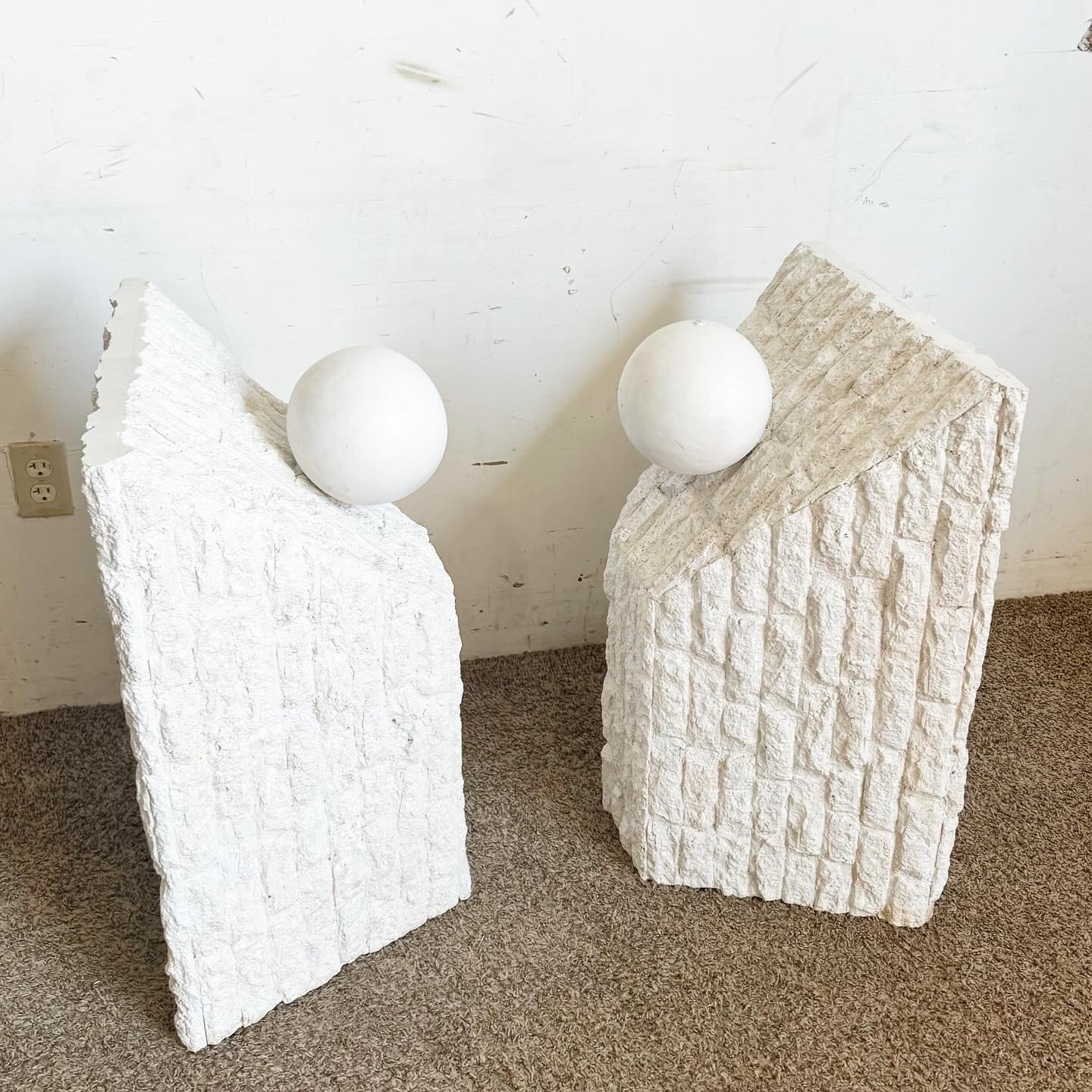 Reimagine your space with this pair of Postmodern Painted White Tessellated Stone Table Bases. These bases blend a contemporary aesthetic with classic design, featuring clean lines and geometric patterns in a fresh white paint. Perfect as supports