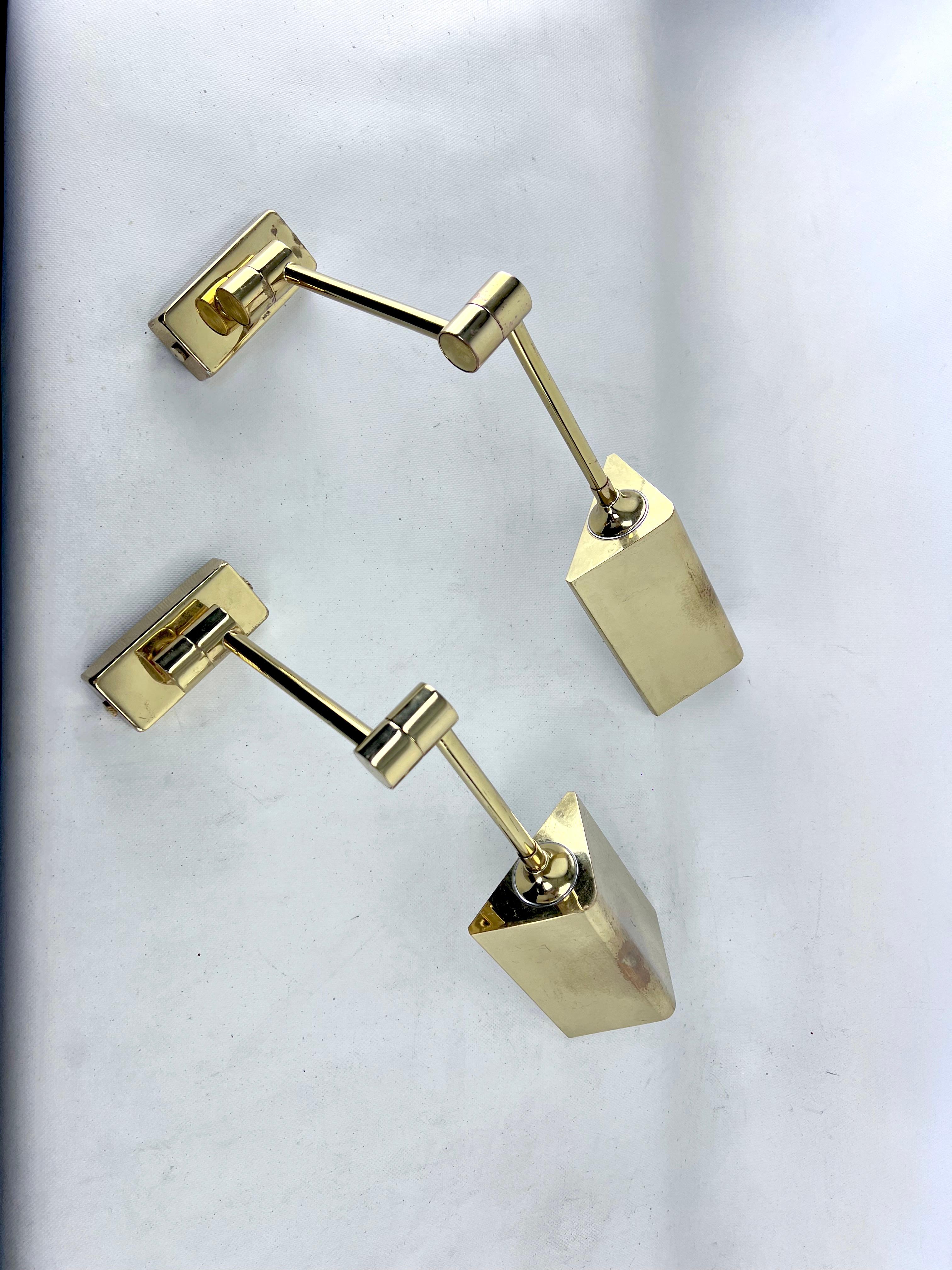 20th Century Postmodern pair of brass wall lamps by Baulmann Leuchten. Germany 1980s For Sale