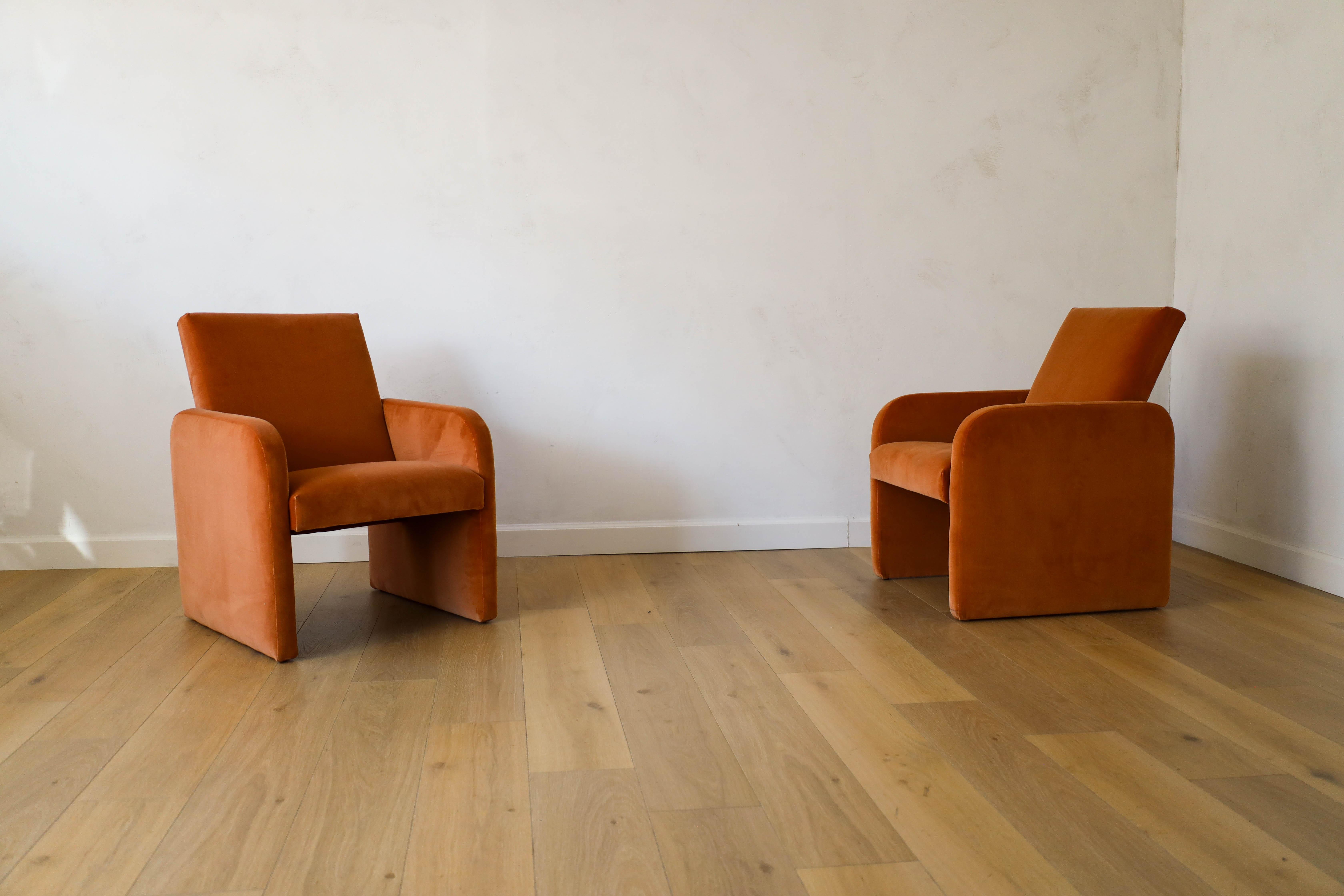 Stunning set of postmodern chairs originating from a boutique hotel in Prague, 1970s. The pair has been reimagined in a beautiful velvet upholstery, offering pink and orange tones varying on the warmth of the room. Give your room the perfect pop of
