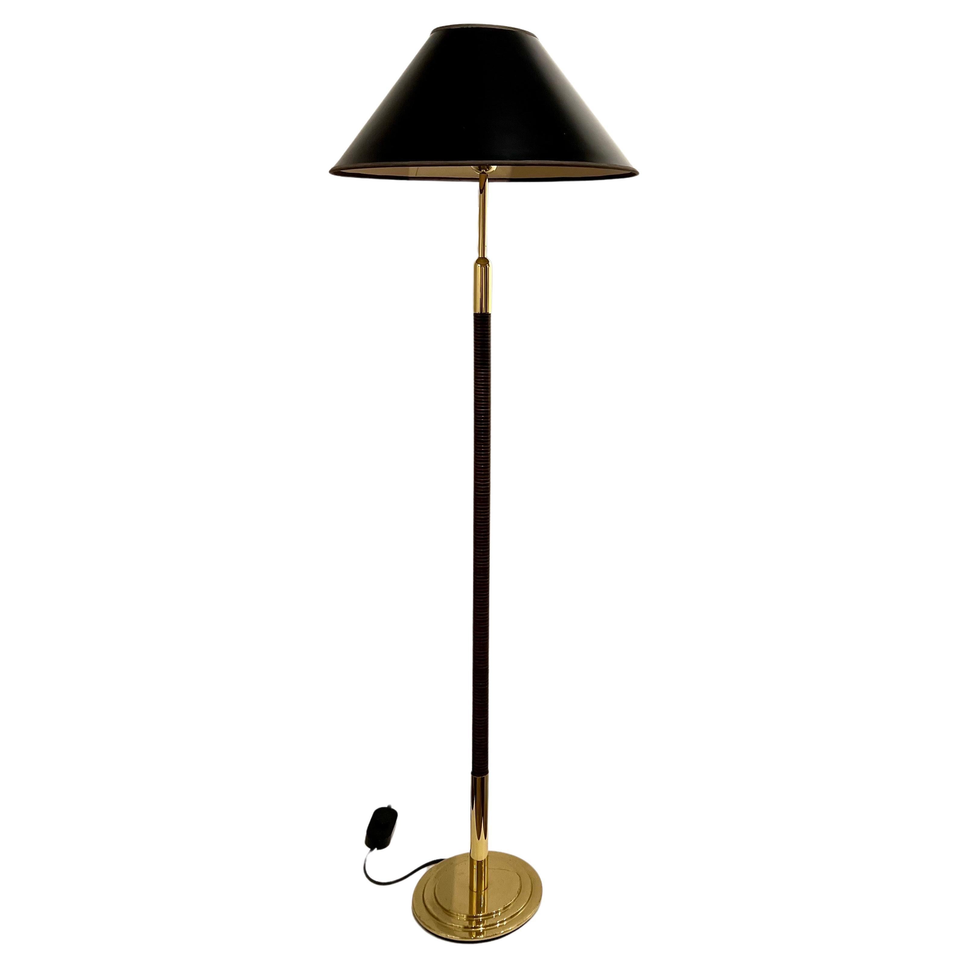 Beautiful elegant polished brass Floor and table lamps set, circa the 1980s with cane-wrapped pole original lampshades, perfect working condition. The desk lamp and 8