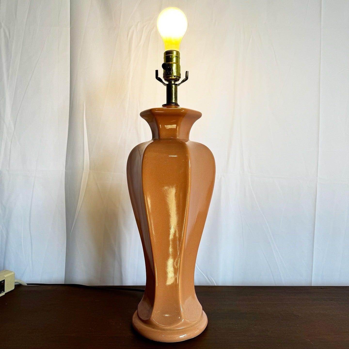 Elevate your decor with a Postmodern Pastel Pink Table Lamp, featuring a glossy ceramic base and sculptural design for a touch of elegance.
 
 We sell items as acquired, without restoring or repairing. Vintage pieces may have age-related wear.