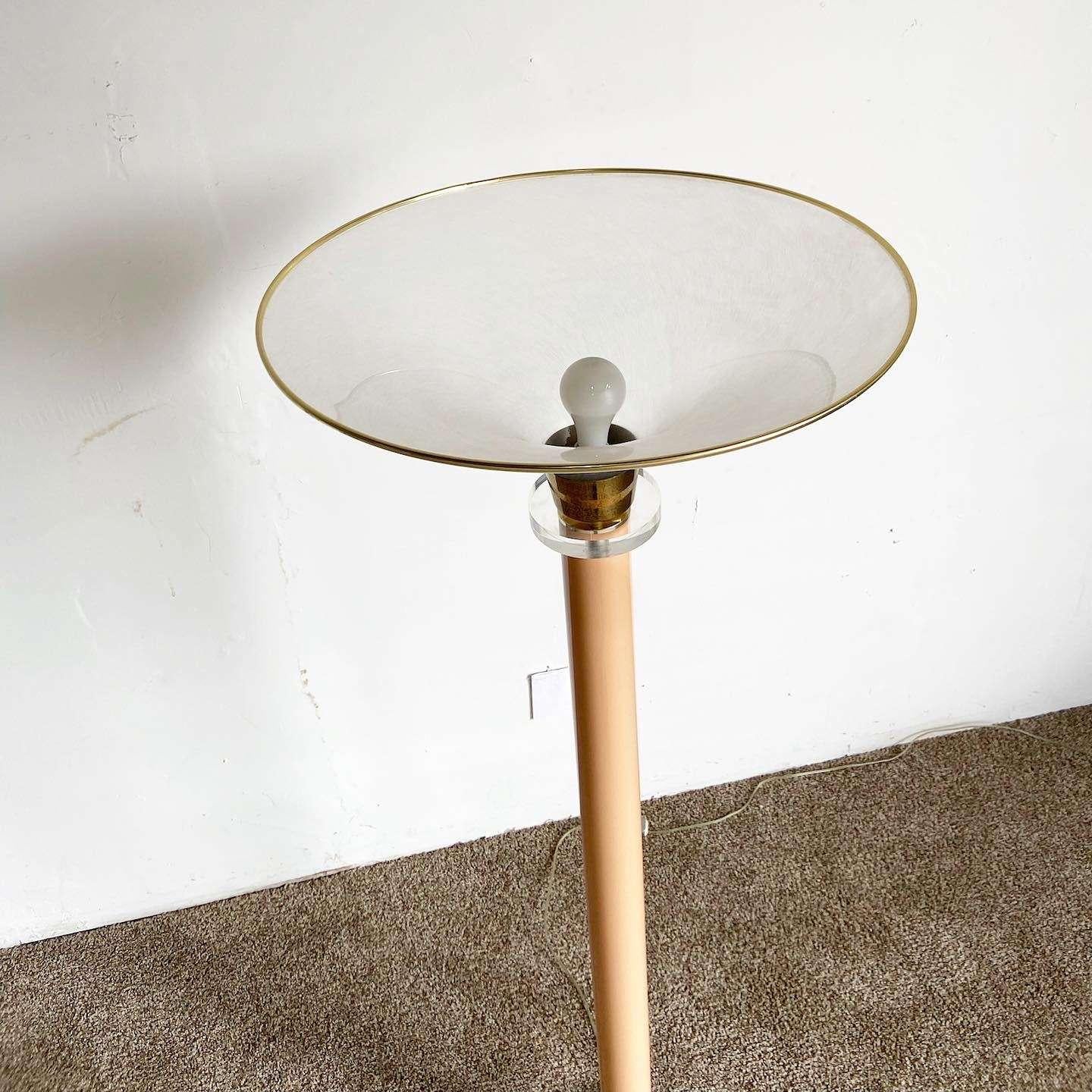 Amazing vintage postmodern dimmable floor lamp. Features a peach stem with lucite and brass accents.