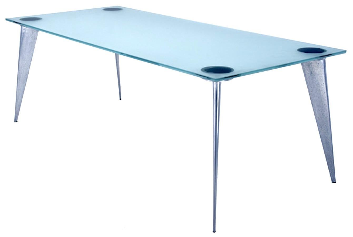 Philippe Starck (série lang) modernist dining table for Driade/aleph, circa 1985. Manufactured by Driade/Aleph. Dining table having a frosted glass top raised on cast aluminum tapering splayed legs. Legs marked 