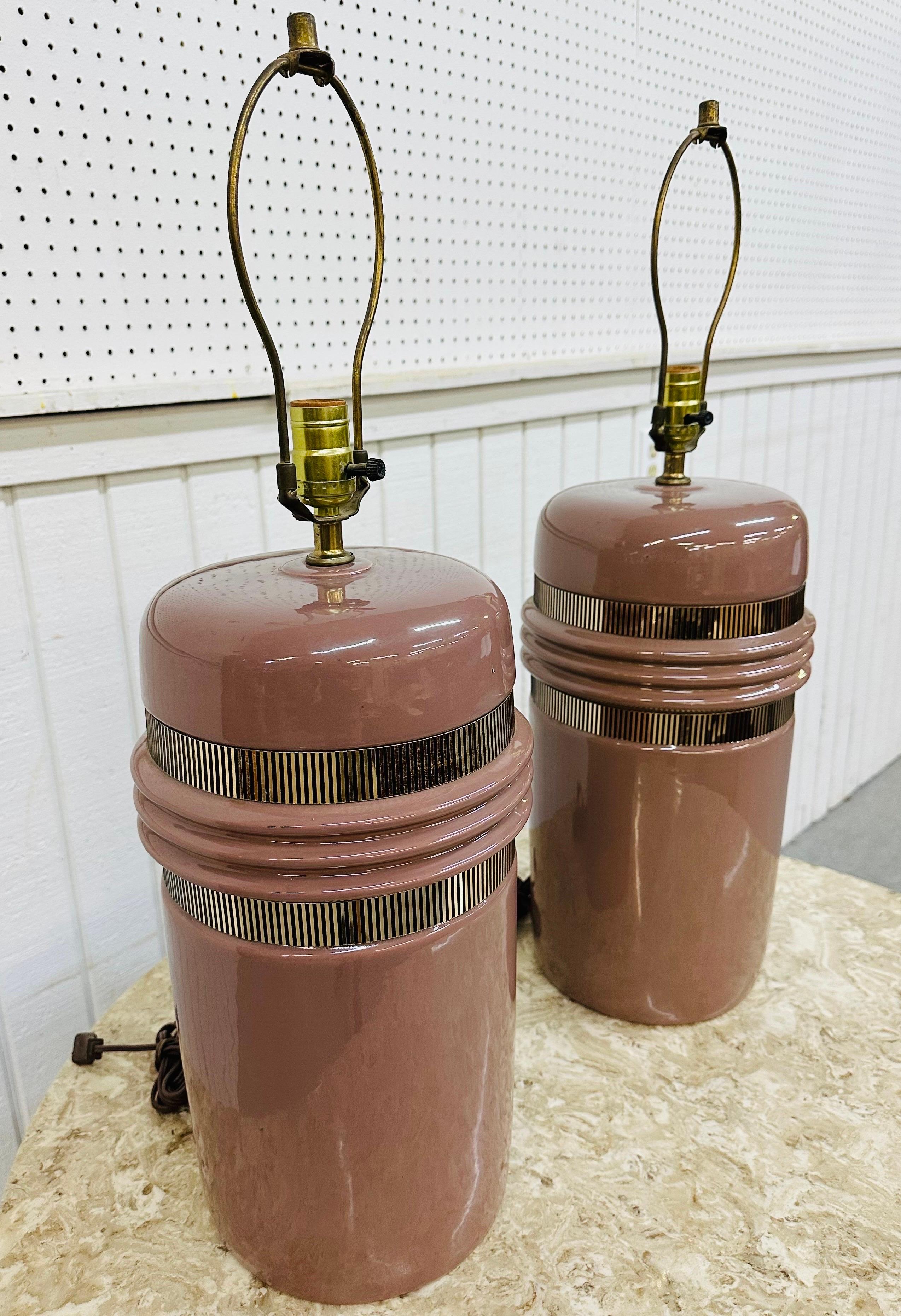 This listing is for a pair of Postmodern Pink & Brass Table Lamps. Featuring pink ceramic bodies, brass wrapped accents, original harps and cords. This is an exceptional combination of quality and modern design!