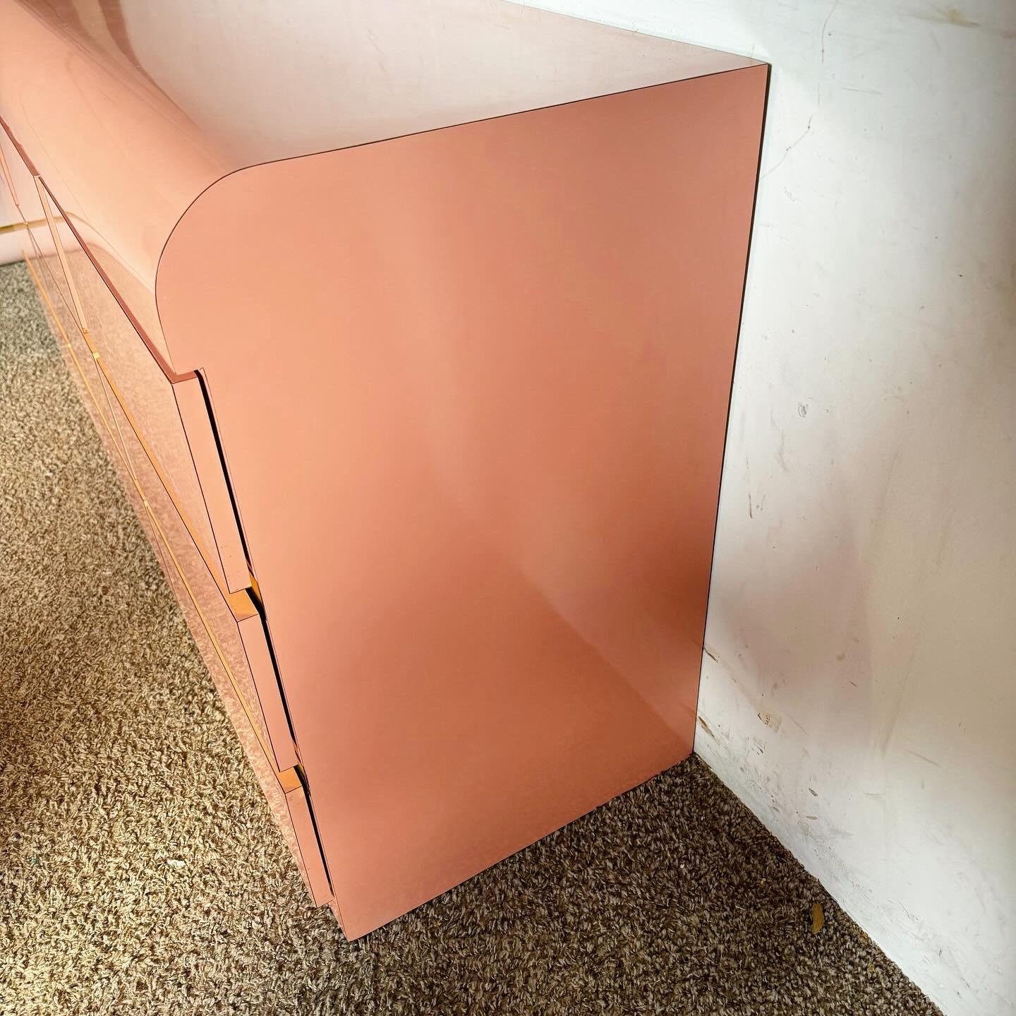 Late 20th Century Postmodern Pink Lacquer Laminate Waterfall Dresser With Gold Accents