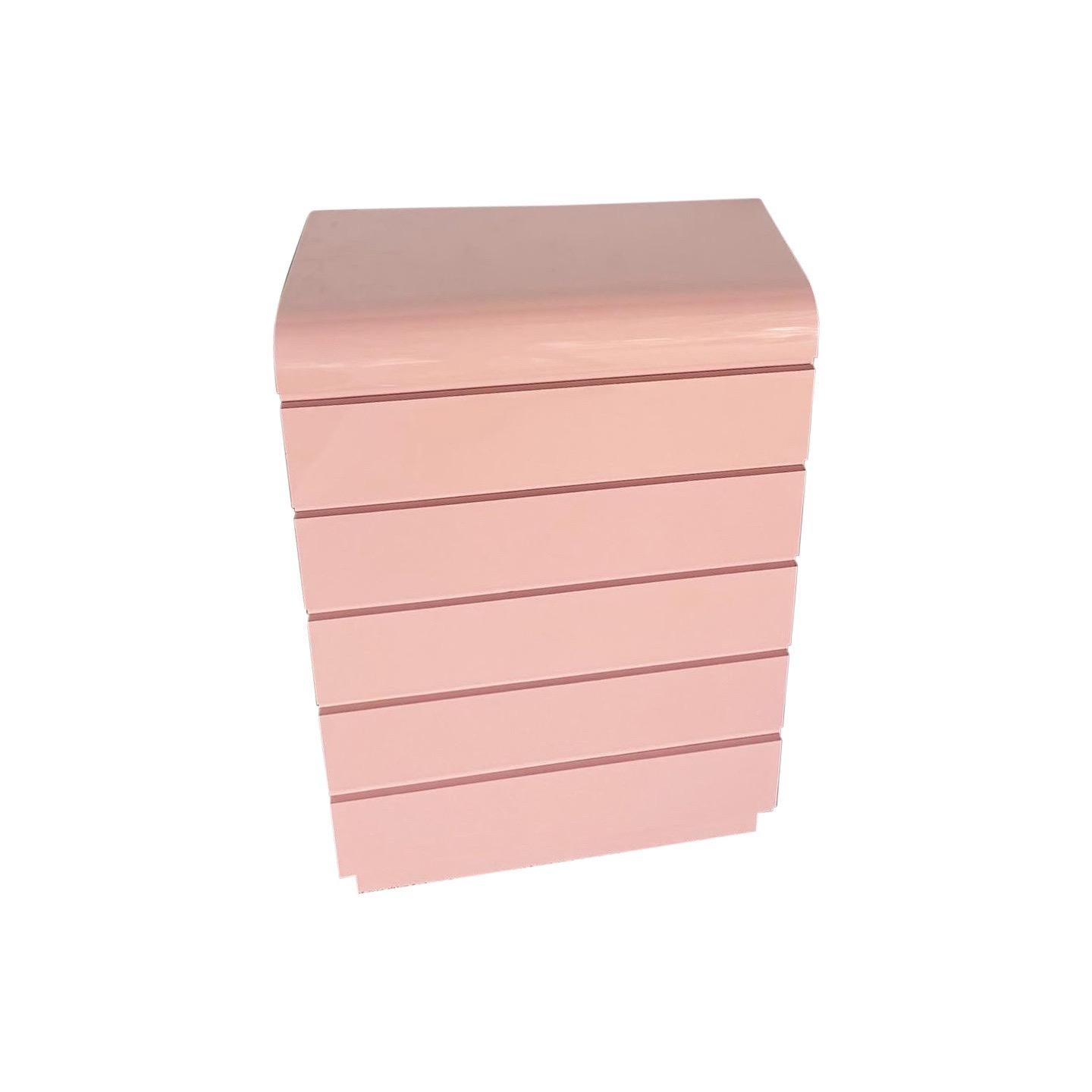 Elevate your space with this Postmodern Pink Lacquer Waterfall Highboy Dresser, featuring a bold pink hue and seamless waterfall design for a striking, contemporary look. A bold statement piece that combines style with functionality.
