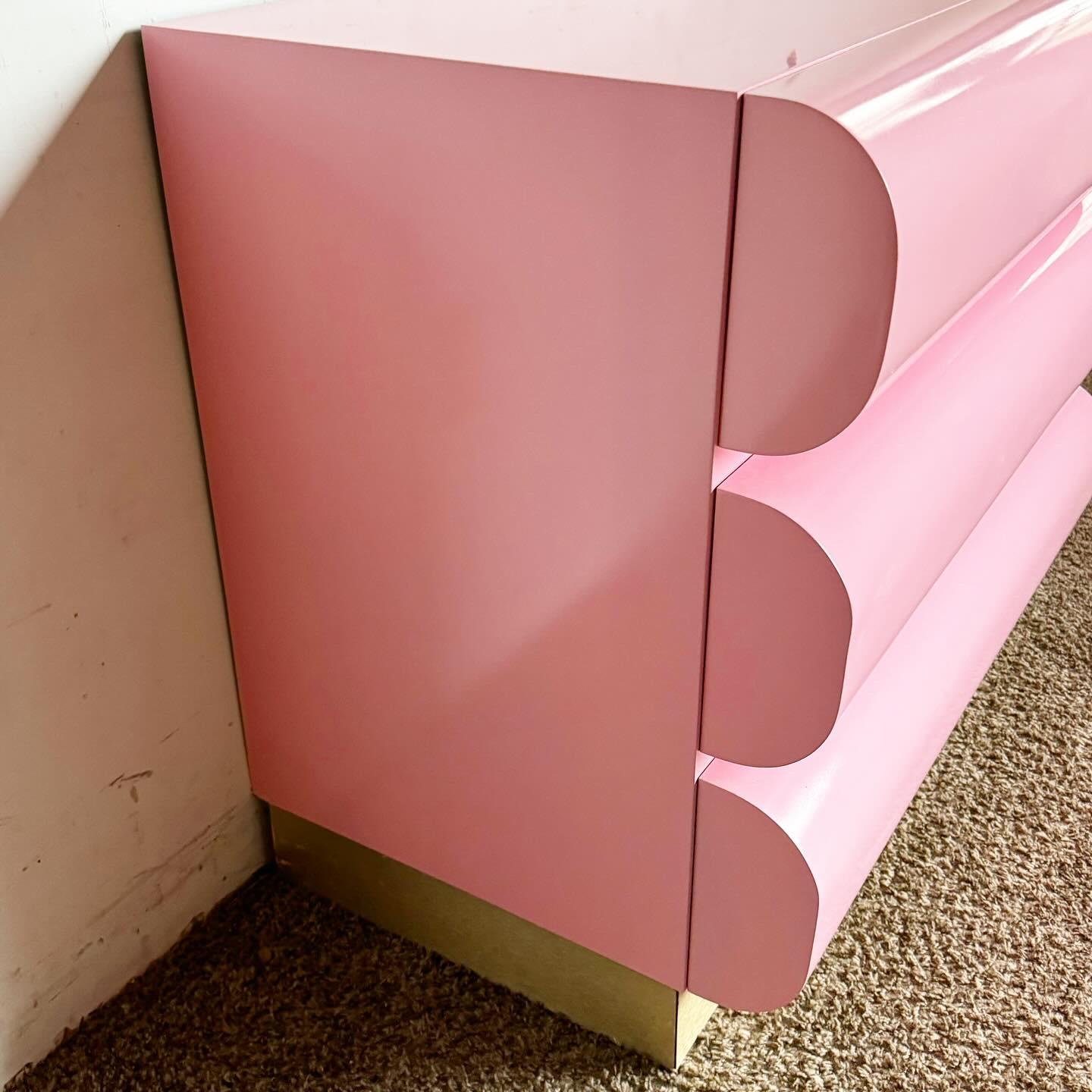 Late 20th Century Postmodern Pink Lacquered Curved Bullnose Chest of Drawers With Gold Accent For Sale