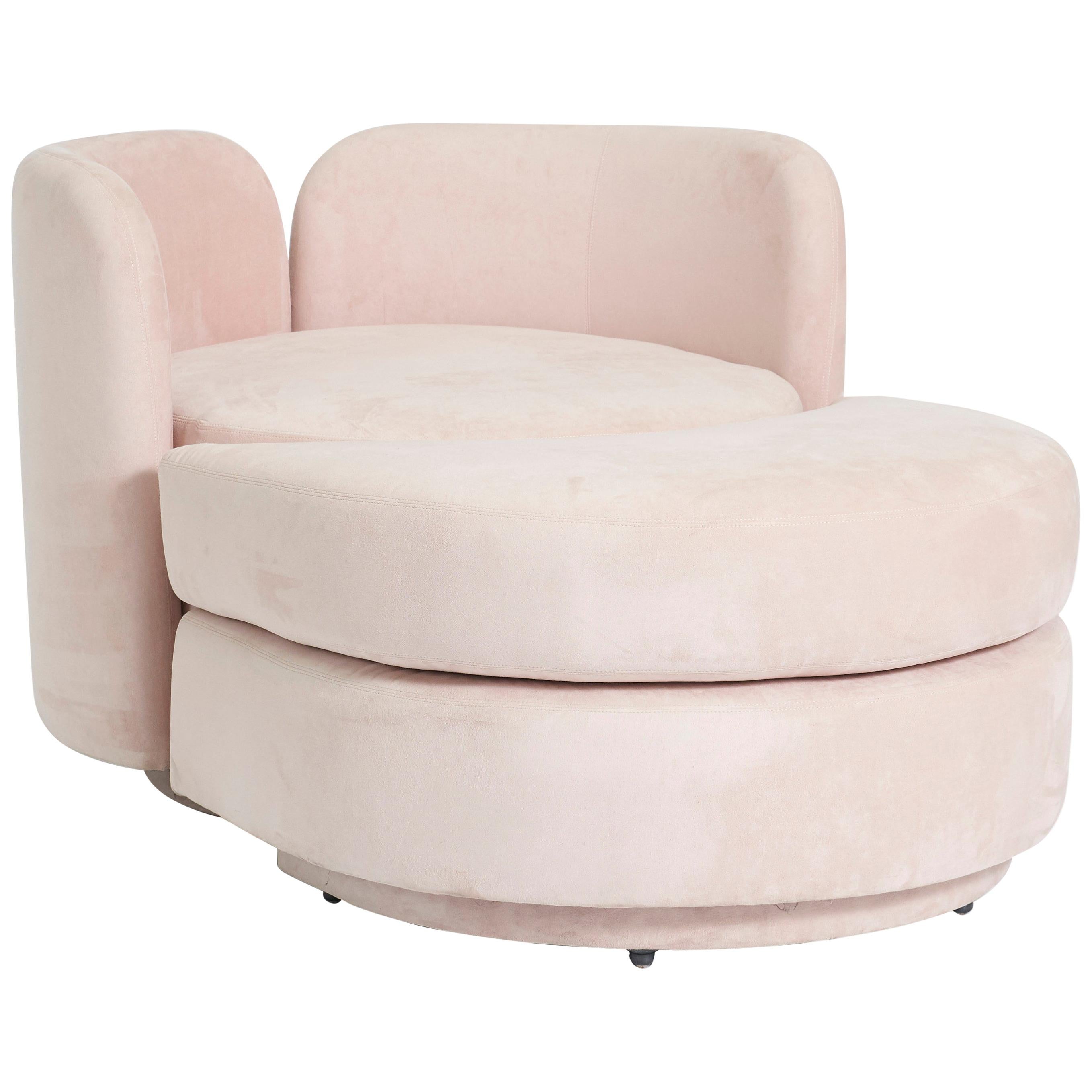 pink chair with ottoman
