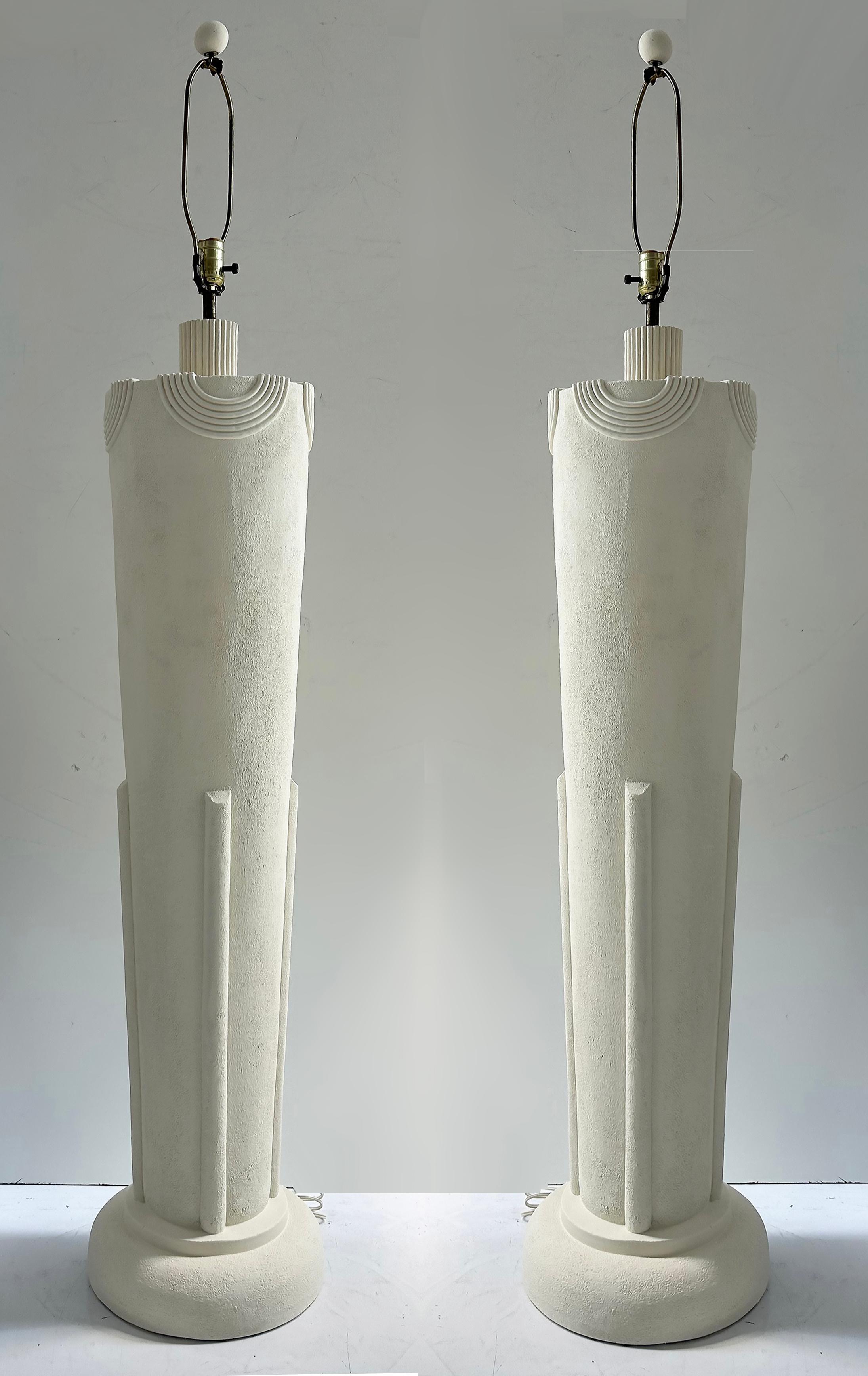 Postmodern Plaster Art Deco Revival Floor Lamps- a Pair

Offered for sale is a pair of substantial floor lamps that will add some vintage Art Deco Revival style to your decor. They are Postmodern in design and they have a raised finish with draped