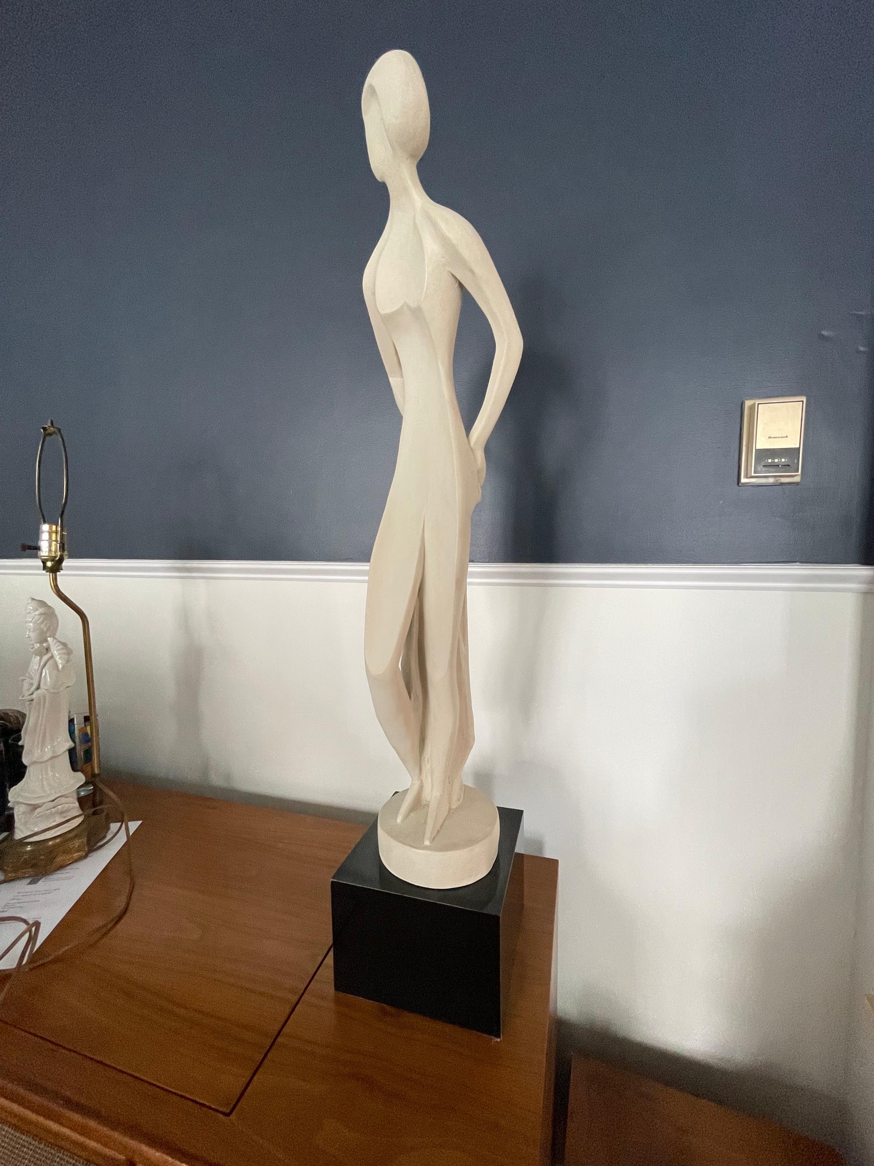 Sleek, glamorous, and graceful Nude by David Fisher for Austin Productions, 1981. Beautiful detail in this postmodern icon. Stand on black plinth base. Free of damage. Signed and dated. About as fine an example as you can find.
Curbside to
