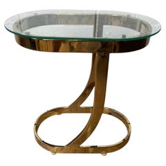 Postmoderner Beistelltisch aus poliertem Messing und Glas im skulpturalen Stil, 1980er Jahre