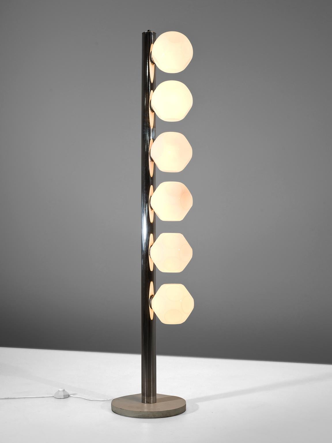 Floor lamp, white plexiglass and metal, Italy, 1960s. 

This playful and unique floor lamp is typical for the post-modern design of the 1970s in Italy. The different shades are placed above one another and form a simplistic yet playful whole