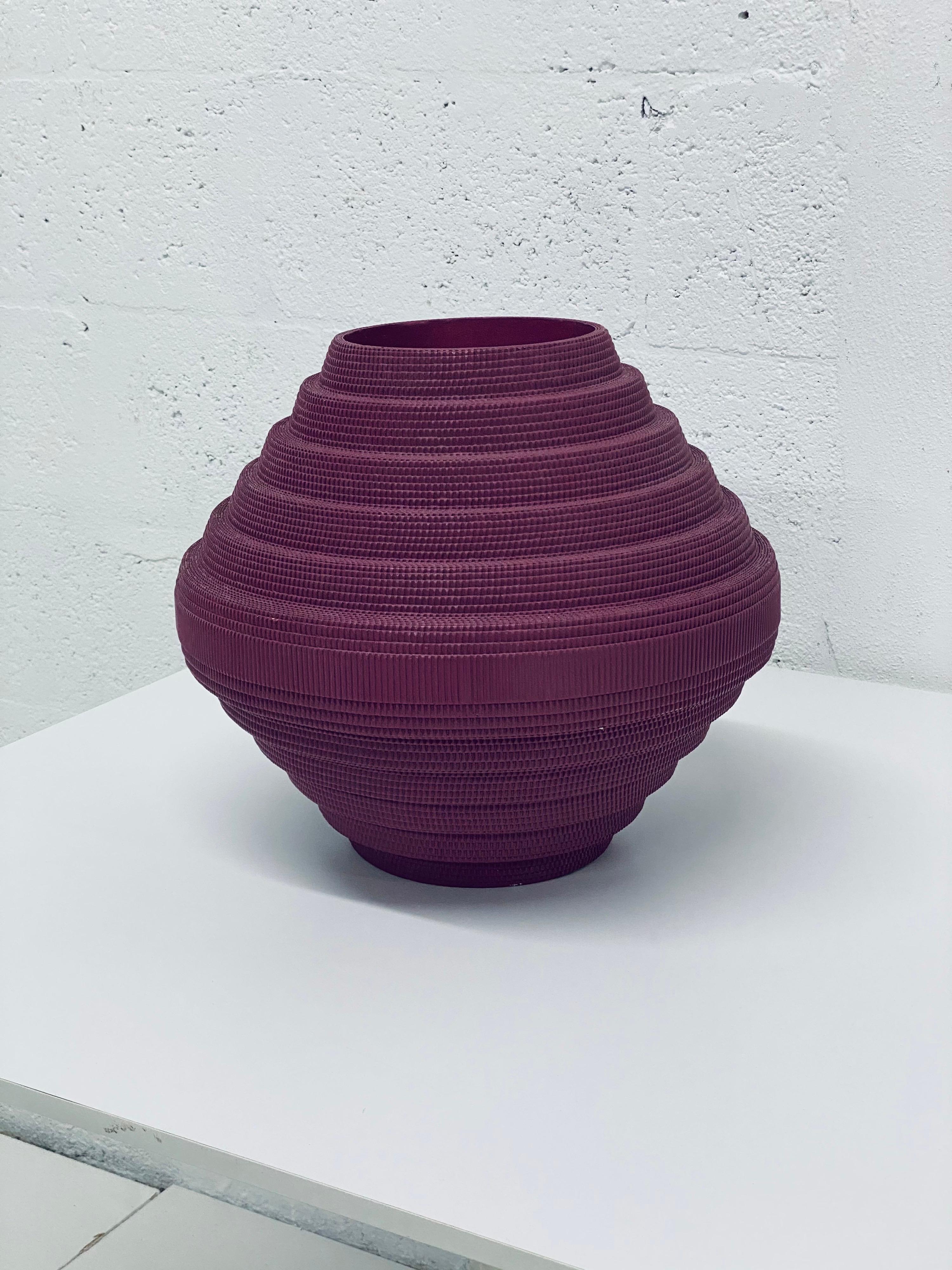 Corrugated cardboard vase rendered in bright purple by Flute, Chicago circa 1980s. Best to use with dried arrangements.