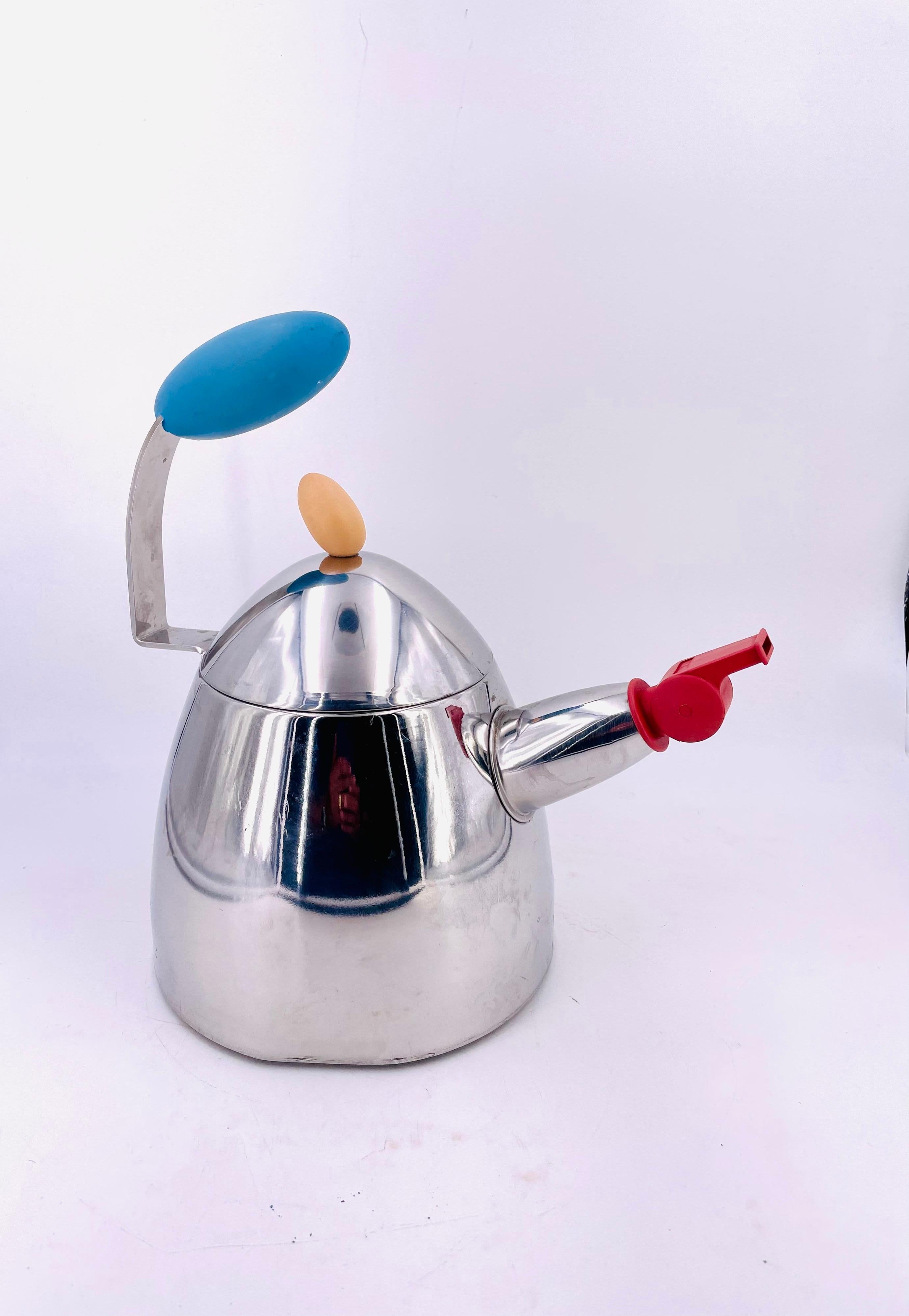 A Classic postmodern Memphis era design teapot designed by Michael Graves, circa the 1980s, a rare design not many were produced it's in good condition except for a ding on the bottom as shown, only shows when you look from the bottom. sold as/is