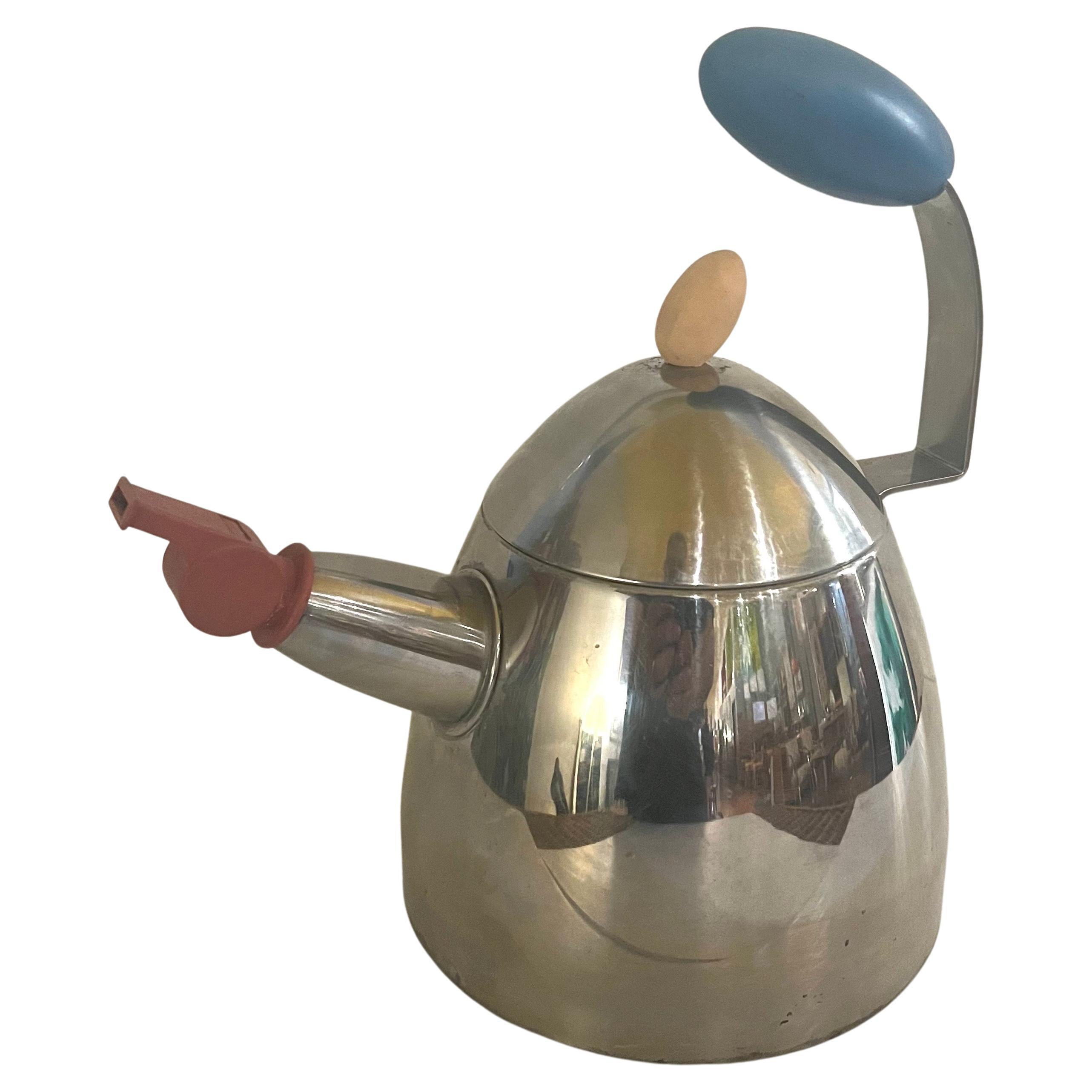 A Classic postmodern Memphis era design teapot designed by Michael Graves, circa the 1980s, a rare design not many were produced it's in good condition except for a ding on the bottom as shown, only shows when you look from the bottom. sold as/is