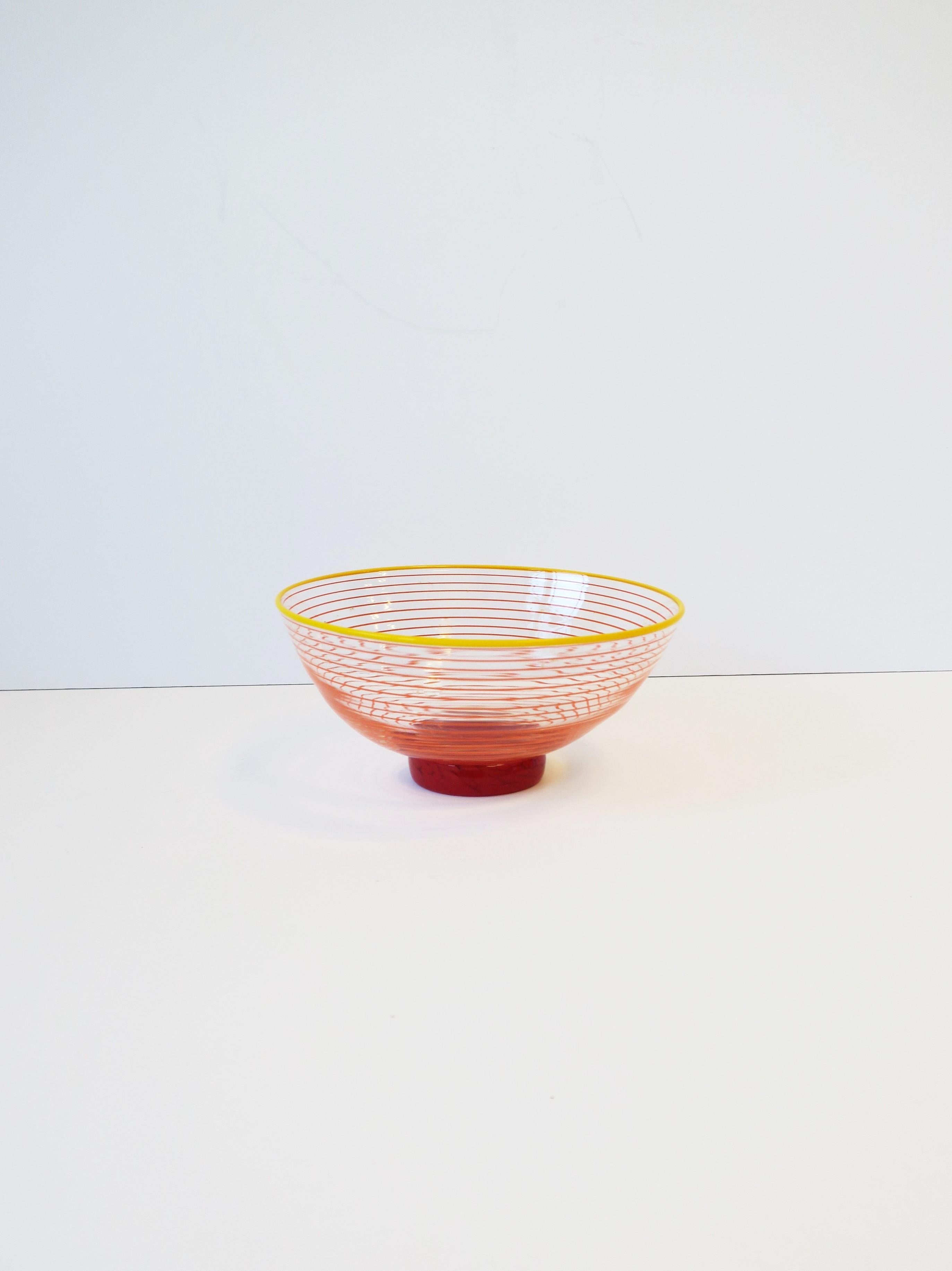 A beautiful signed Post-Modern period red art glass bowl, circa late-20th century. A very beautiful clear/transparent, red, orange and yellow art glass bowl with artist signature on bottom, please see images #11 and 12. Bowl is hand-crafted in